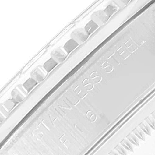 The image shows a close-up view of the bezel and case side of a Rolex Turn-o-Graph 16264 Men's Stainless Steel Silver Dial 16264 Men's Stainless Steel Silver Dial watch, focusing on the "STAINLESS STEEL" engraving.