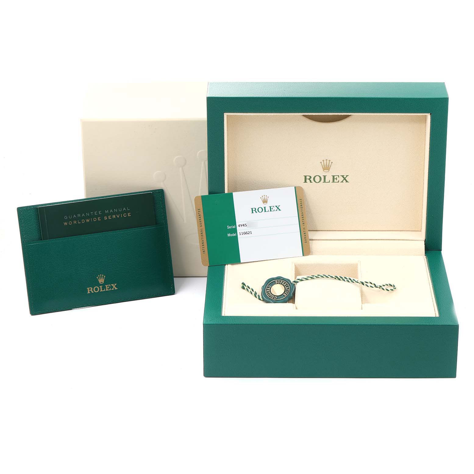 This image shows the packaging, warranty card, and accessories for the Rolex Yacht-Master 116621 Men
s Steel and Gold (two tone) Black Dial 116621 Men
s Steel and Gold (two tone) Black Dial model.
