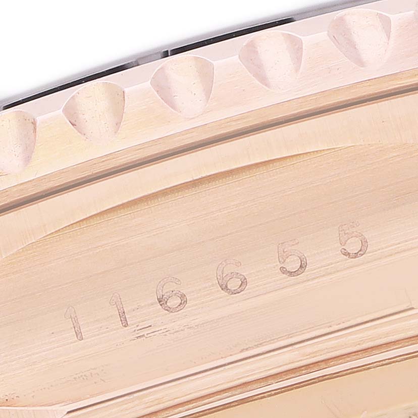 The image shows a close-up of the Rolex Yacht-Master 116655 Men's Rose Gold Black Dial's bezel and engraved model number.