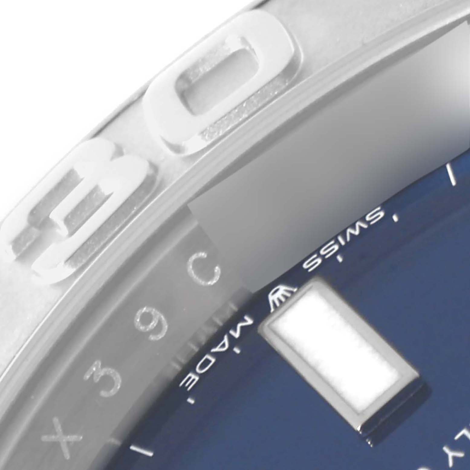 This image shows a close-up of the bezel, part of the dial, and hour marker of a Rolex Yacht-Master 126622 Men's Stainless Steel Blue Dial 126622 Men's Stainless Steel Blue Dial watch at an angled view.