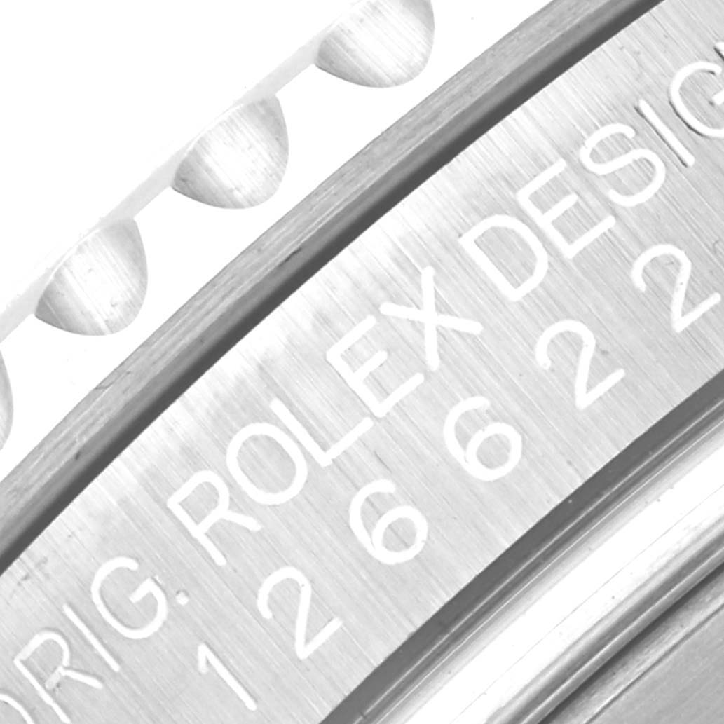 Close-up angle showing the etched inscription and part of the bezel teeth of a Rolex Yacht-Master 126622 Men's Stainless Steel Blue Dial 126622 Men's Stainless Steel Blue Dial watch.