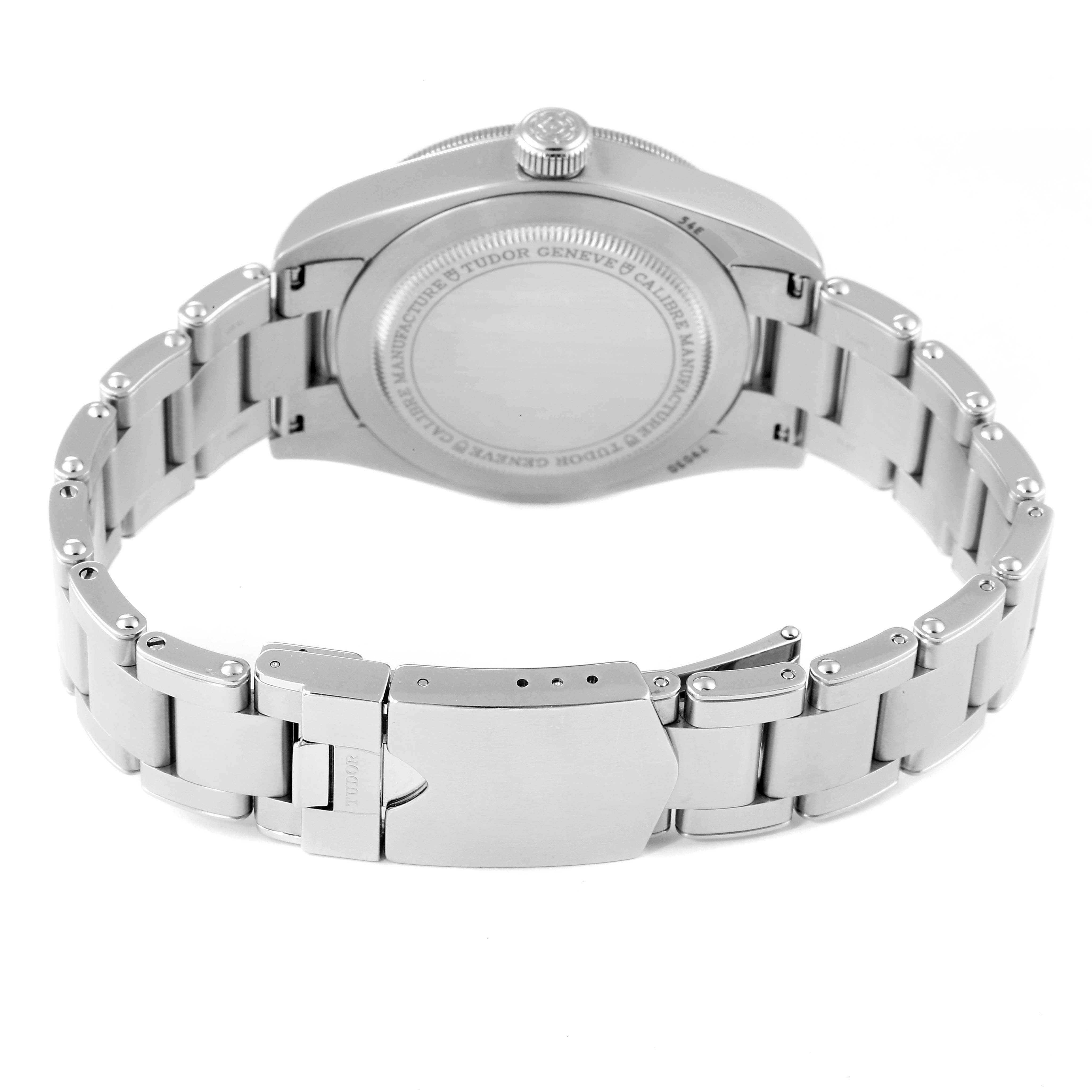 The image shows the backside and bracelet of a Tudor Heritage Black Bay 79030N Men
s Stainless Steel Black Dial 79030N Men
s Stainless Steel Black Dial watch, including the clasp and case back.