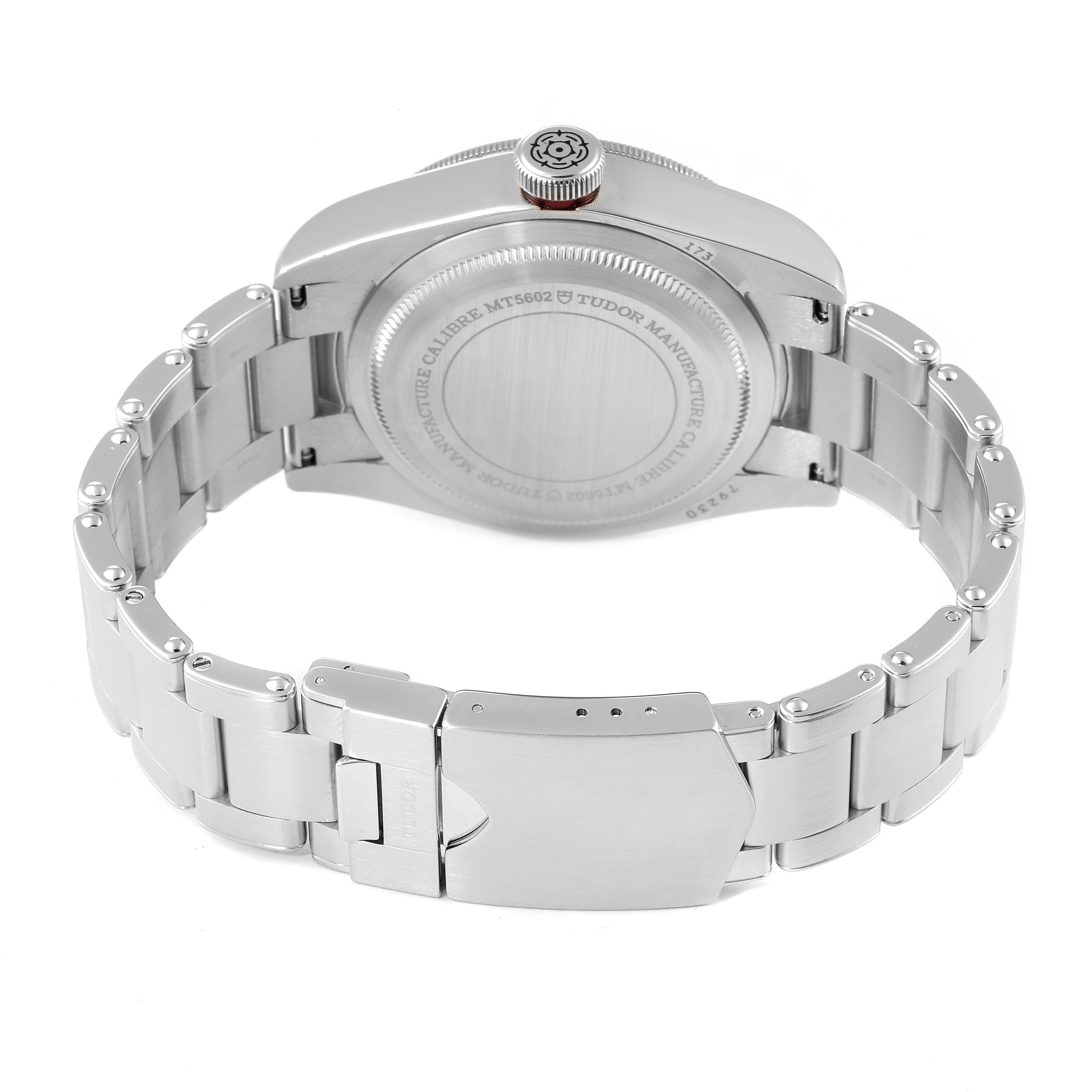 The image shows the back case and bracelet of the Tudor Heritage Black Bay 79230R Men
s Stainless Steel Black Dial 79230R Men
s Stainless Steel Black Dial watch, highlighting the clasp and case back.