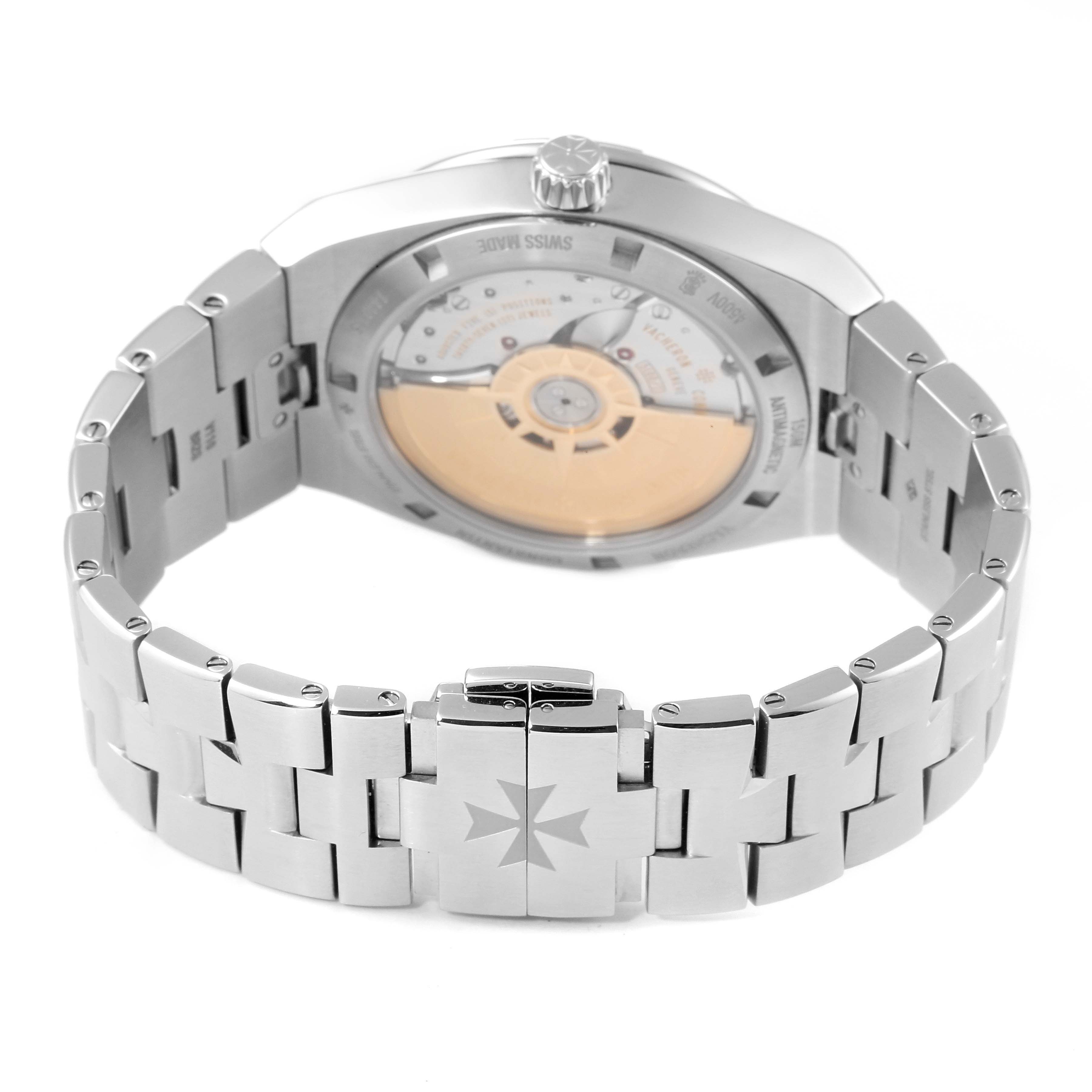 The image shows the back of the Vacheron Constantin Overseas 4500V/110A Men's Stainless Steel Black Dial 4500V/110A Men's Stainless Steel Black Dial watch, highlighting the bracelet and the transparent case back with its mechanical movement.