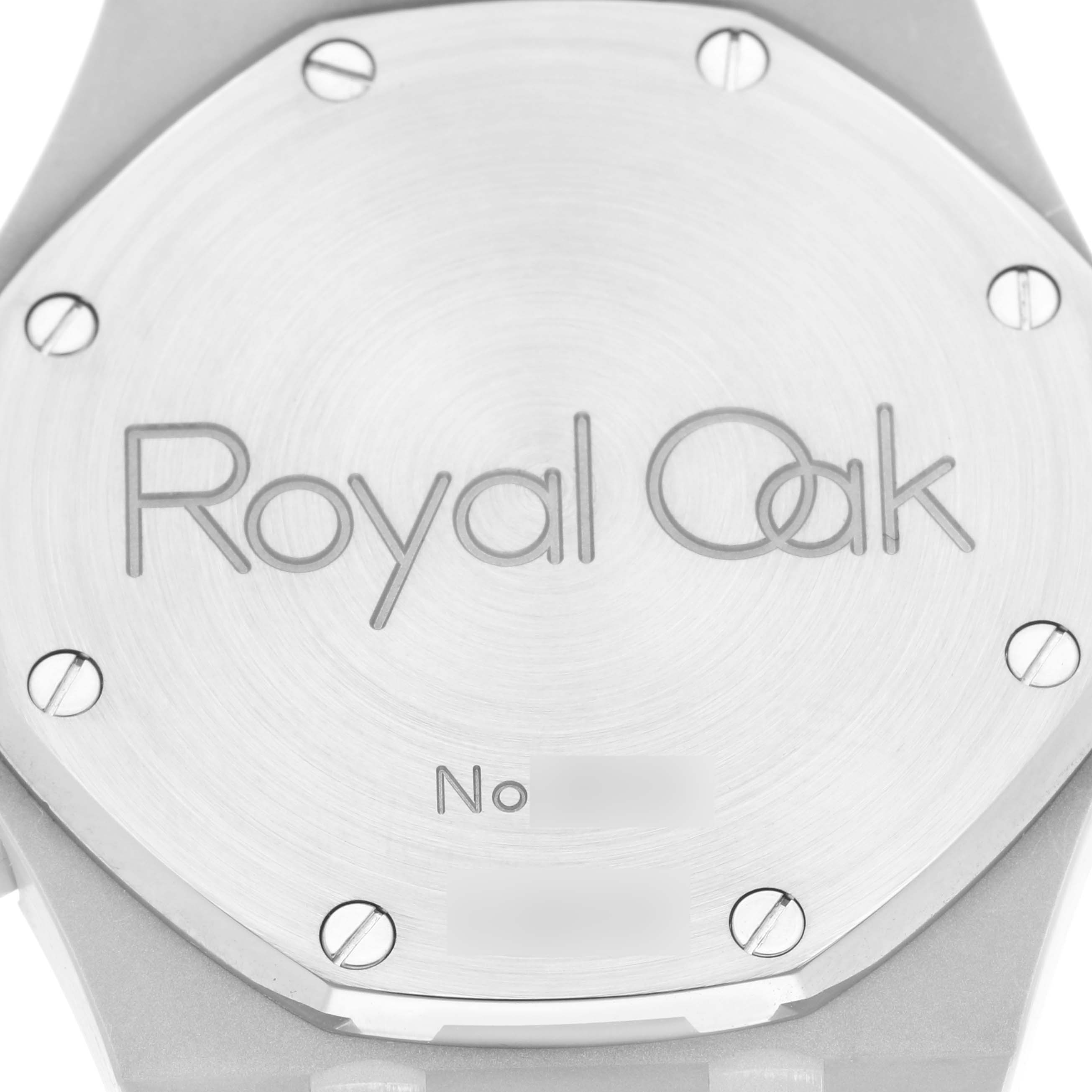 The image shows the back case of the Audemars Piguet Royal Oak 25860ST.00.1110ST.01 Men's Stainless Steel Black Dial 25860ST.00.1110ST.01 Men's Stainless Steel Black Dial watch, featuring its engraved logo and secured by screws.