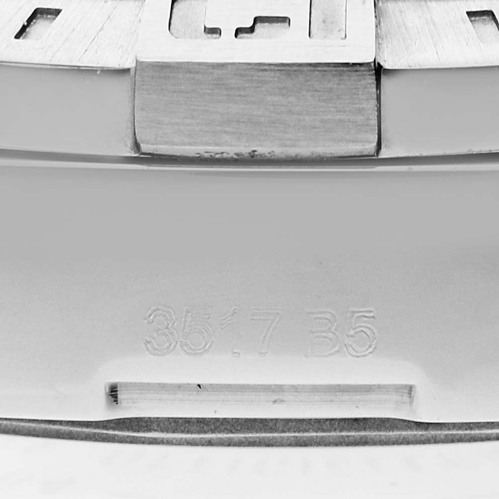 This image shows the clasp and part of the bracelet of a Breitling Avenger A3239011 Men's Stainless Steel Mother of Pearl Dial A3239011 Men's Stainless Steel Mother of Pearl Dial watch, with a partial view of engraved numbers.