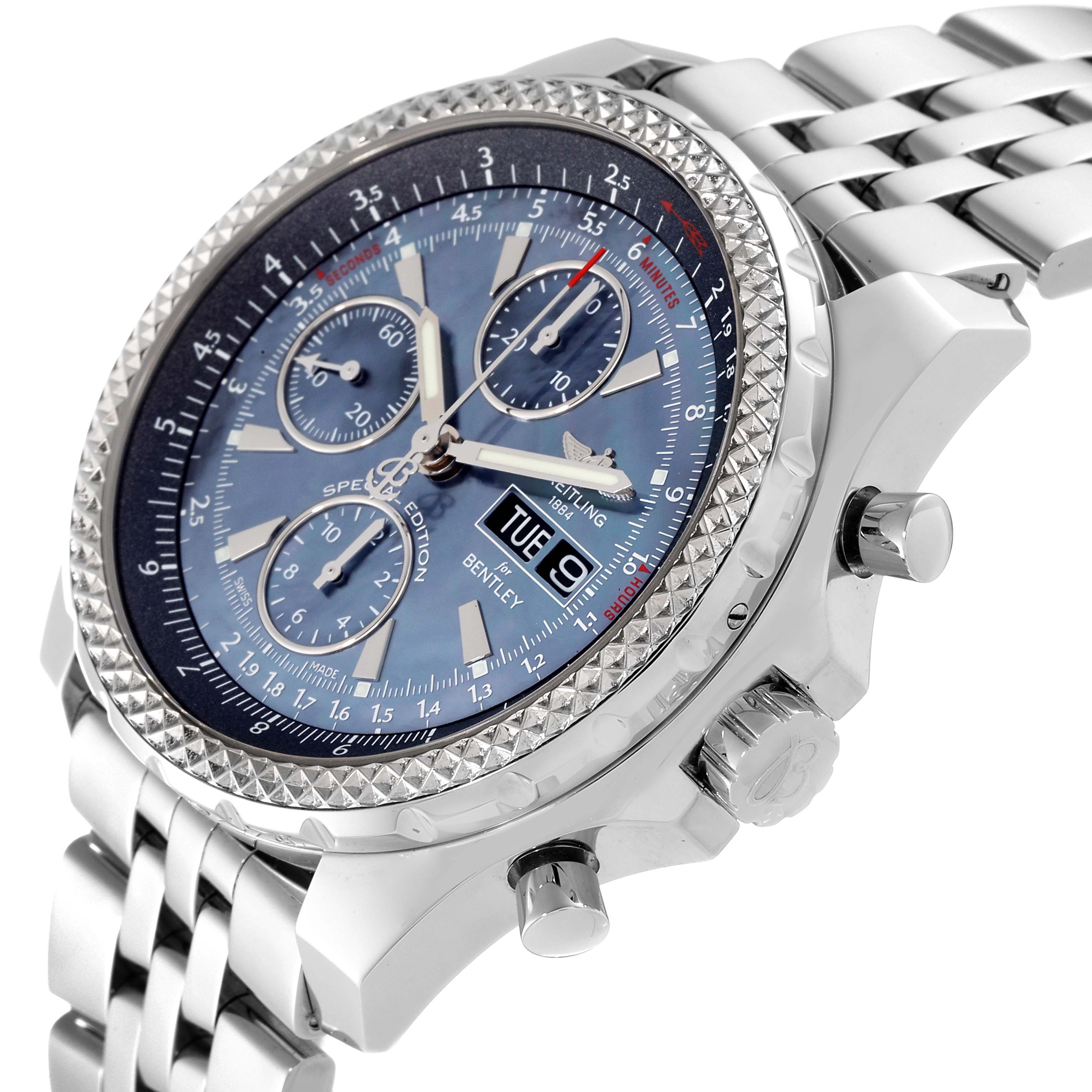 The image shows a Bentley model Breitling watch at an oblique angle, highlighting its dial, bezel, chronograph buttons, and metal bracelet.