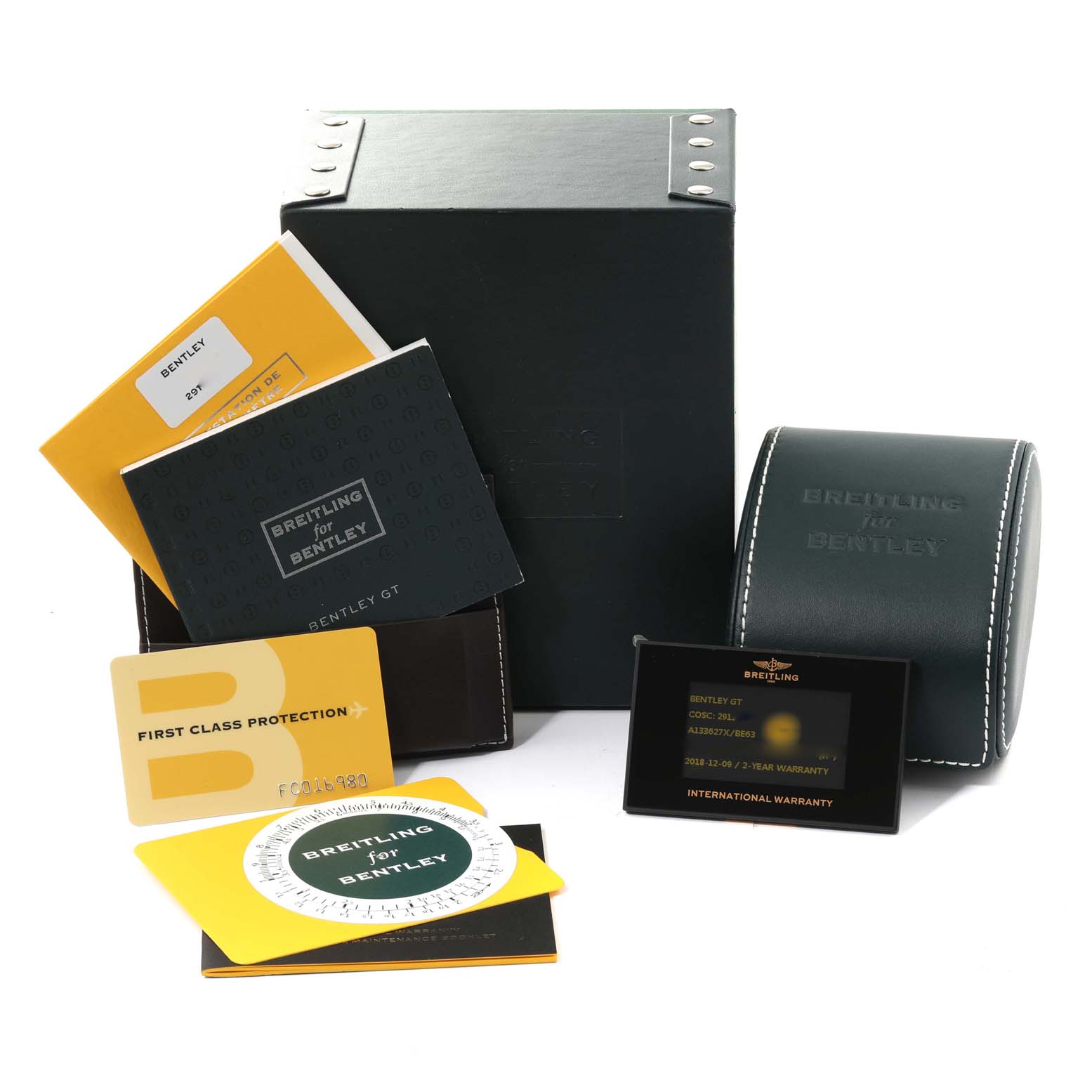 The image shows the box and accessories for a Bentley model by Breitling, including manuals and warranty cards.