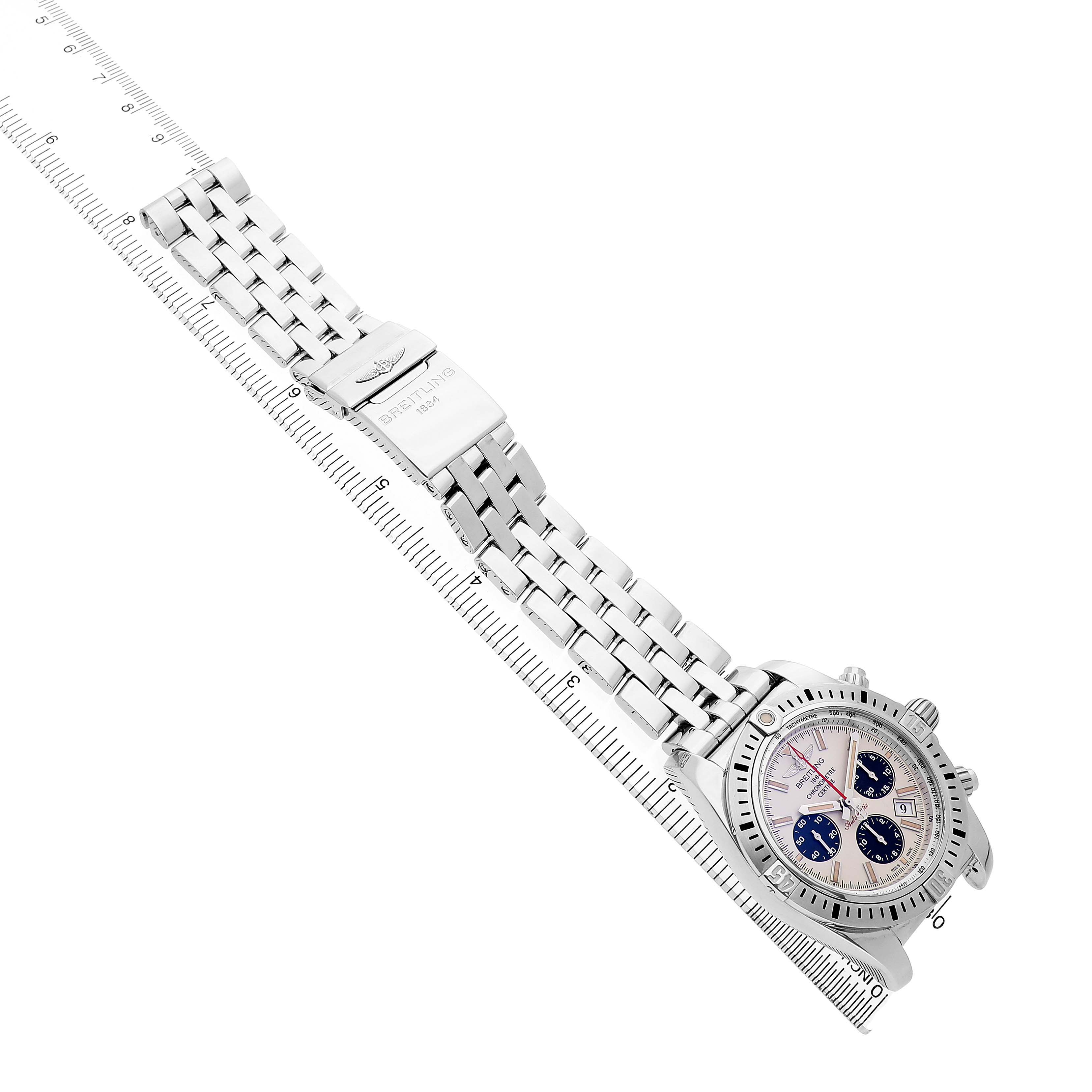 The Breitling Chronomat AB0115 Men's Stainless Steel Silver Dial watch is shown at a diagonal angle, displaying its face, bracelet, and clasp.