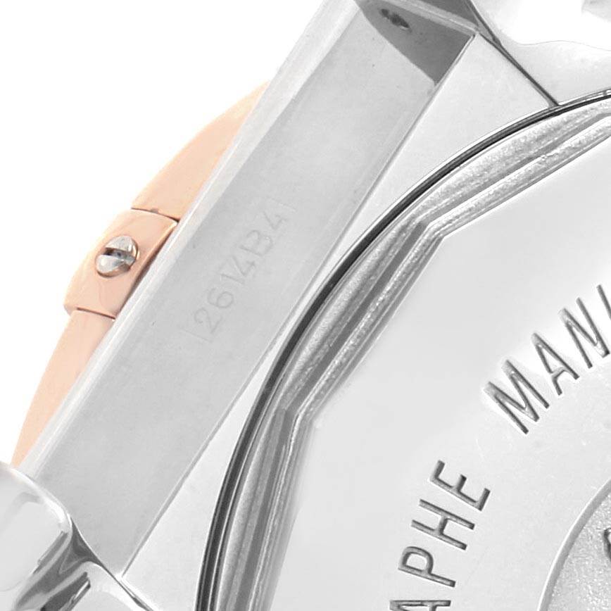 The image shows a close-up of the caseback and part of the bracelet of the Breitling Chronomat CB0110 Men
s Steel and Gold (two tone) Brown Dial CB0110 Men
s Steel and Gold (two tone) Brown Dial watch.