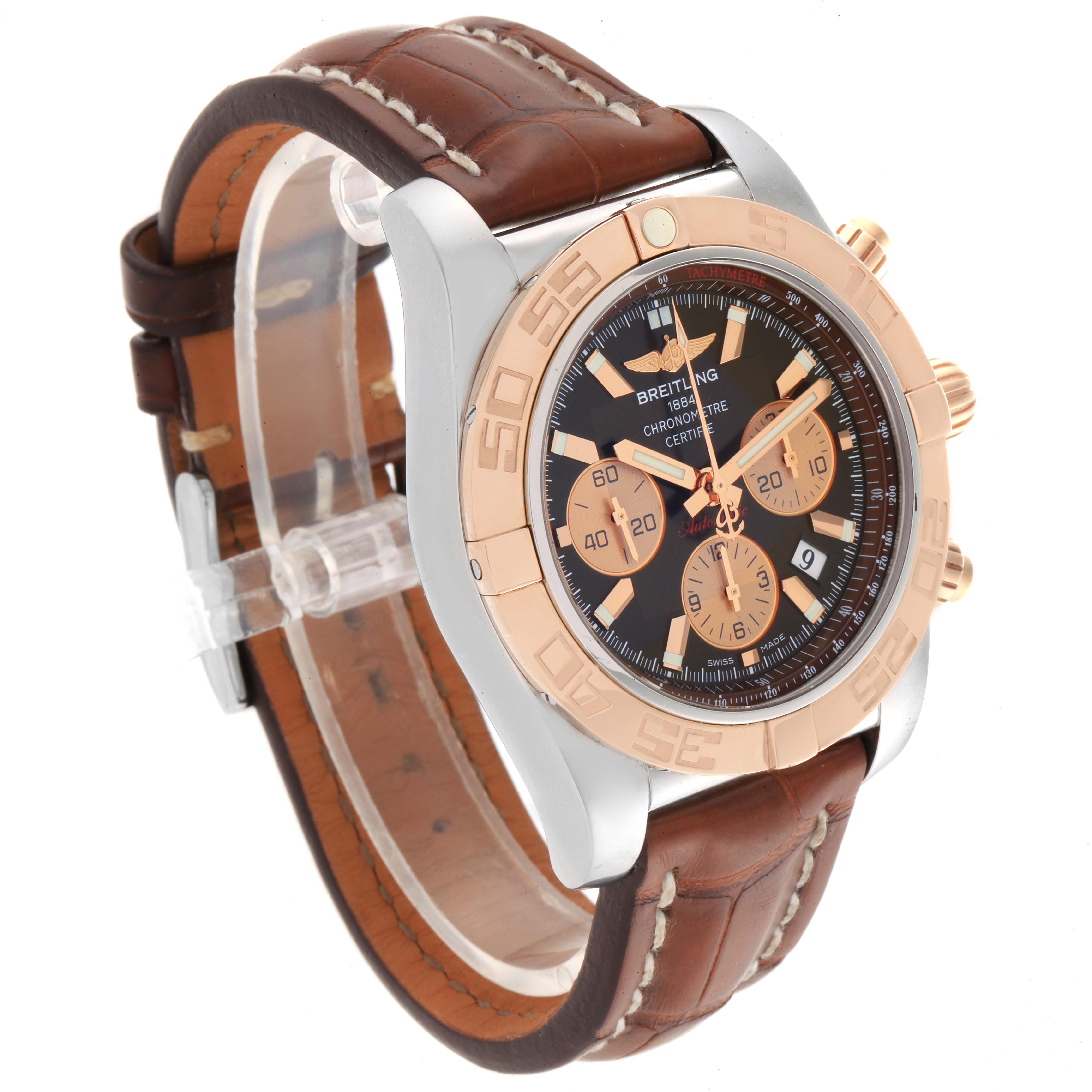 The Breitling Chronomat CB0110 Men
s Steel and Gold (two tone) Brown Dial CB0110 Men
s Steel and Gold (two tone) Brown Dial watch is shown at a three-quarter angle, displaying the dial, bezel, chronograph subdials, and leather strap.