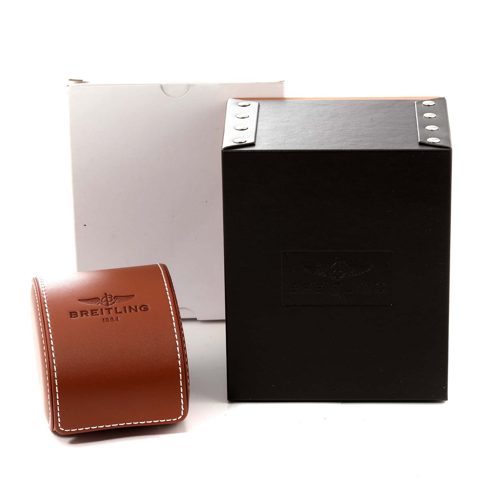 The image shows the packaging accessories for a Breitling Navitimer AB0127 Men
s Stainless Steel Black Dial AB0127 Men
s Stainless Steel Black Dial, including a brown leather watch case and a black box.