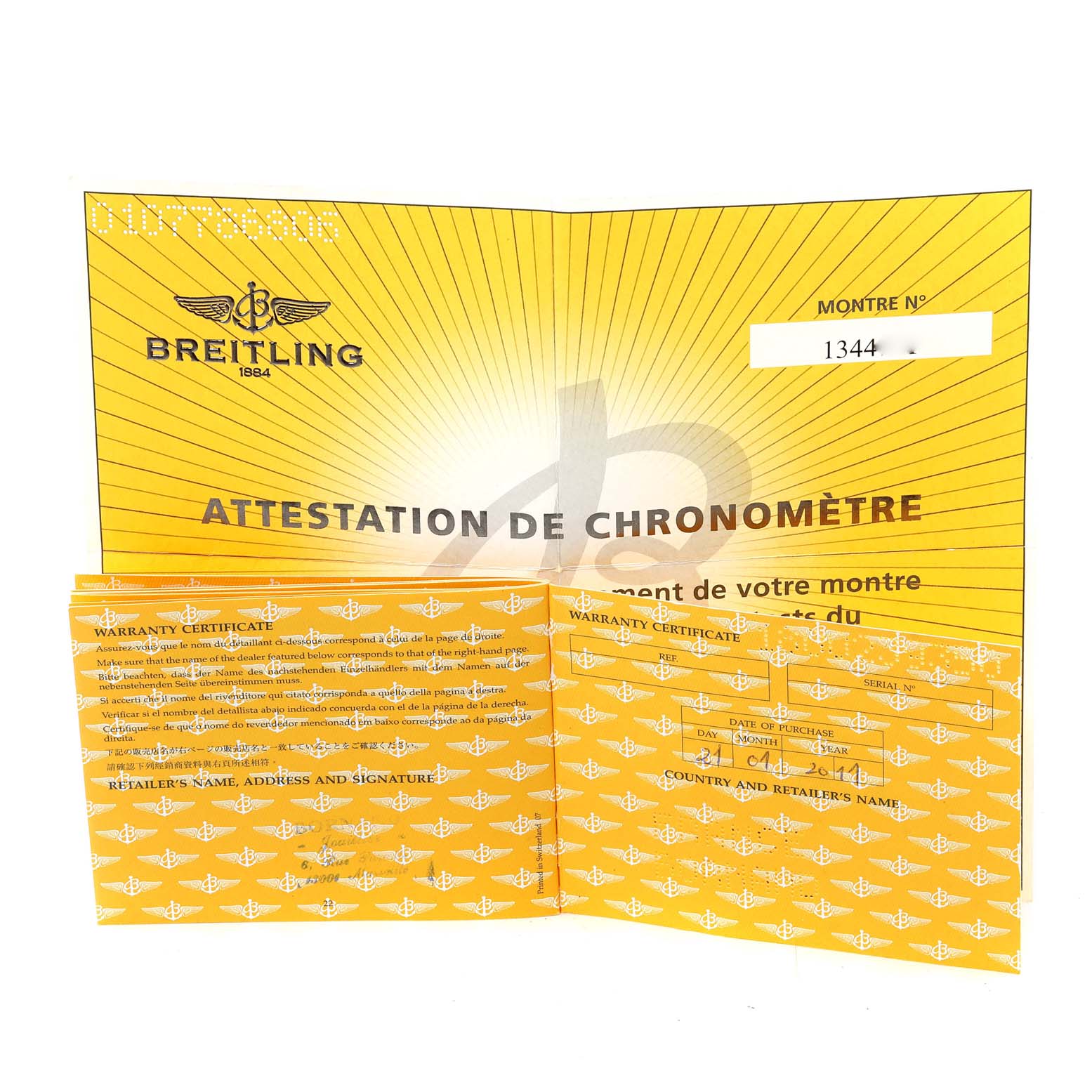 This image shows the warranty certificate and attestation of chronometer for a Breitling Superocean A17364 Men's Stainless Steel Black Dial A17364 Men's Stainless Steel Black Dial watch.