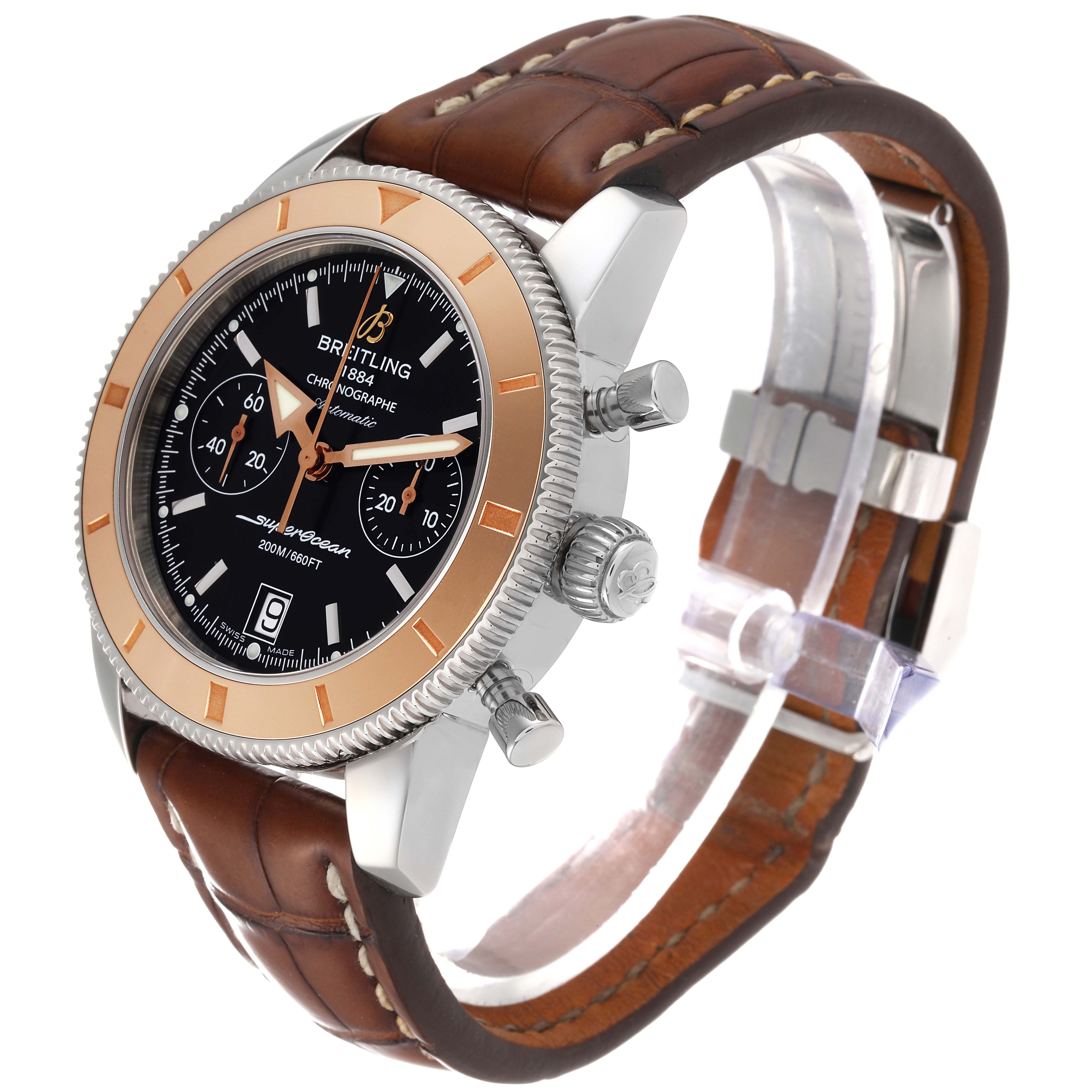 The image shows a side angle of the Breitling Superocean U23370 Men's Steel and Gold (two tone) Black Dial U23370 Men's Steel and Gold (two tone) Black Dial watch, highlighting its brown leather strap, bezel, and dial.