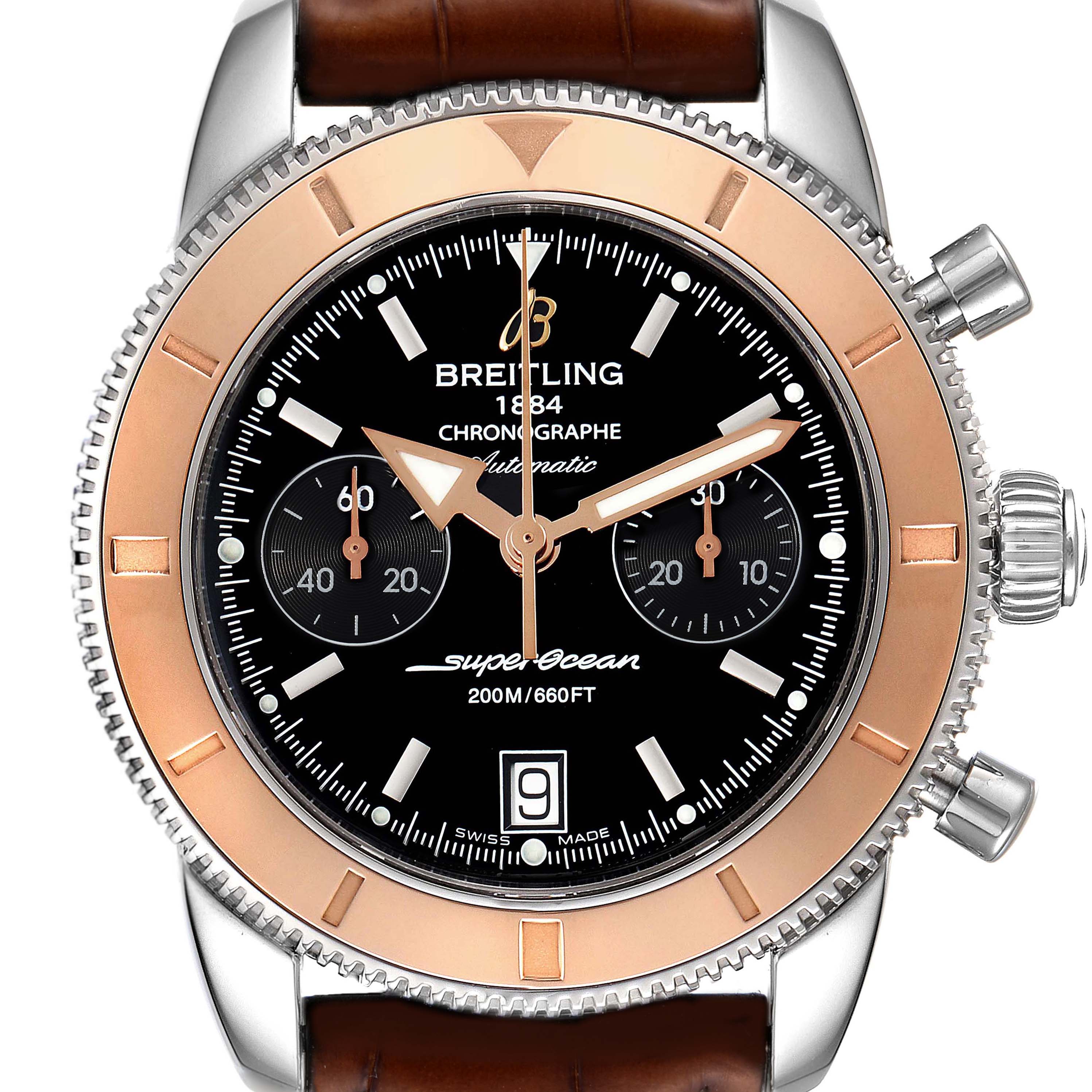 The Breitling Superocean U23370 Men's Steel and Gold (two tone) Black Dial U23370 Men's Steel and Gold (two tone) Black Dial watch is shown from a front angle, displaying its dial, bezel, and part of the leather strap.