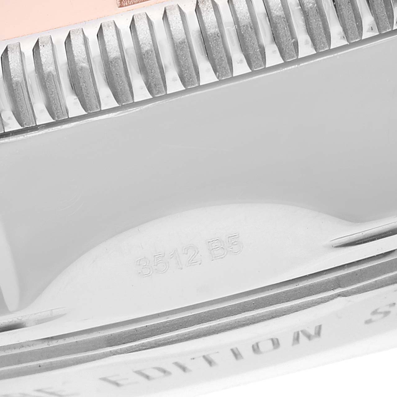 The image shows a close-up of the bezel and partial case back of a Breitling Superocean U23370 Men's Steel and Gold (two tone) Black Dial U23370 Men's Steel and Gold (two tone) Black Dial watch.