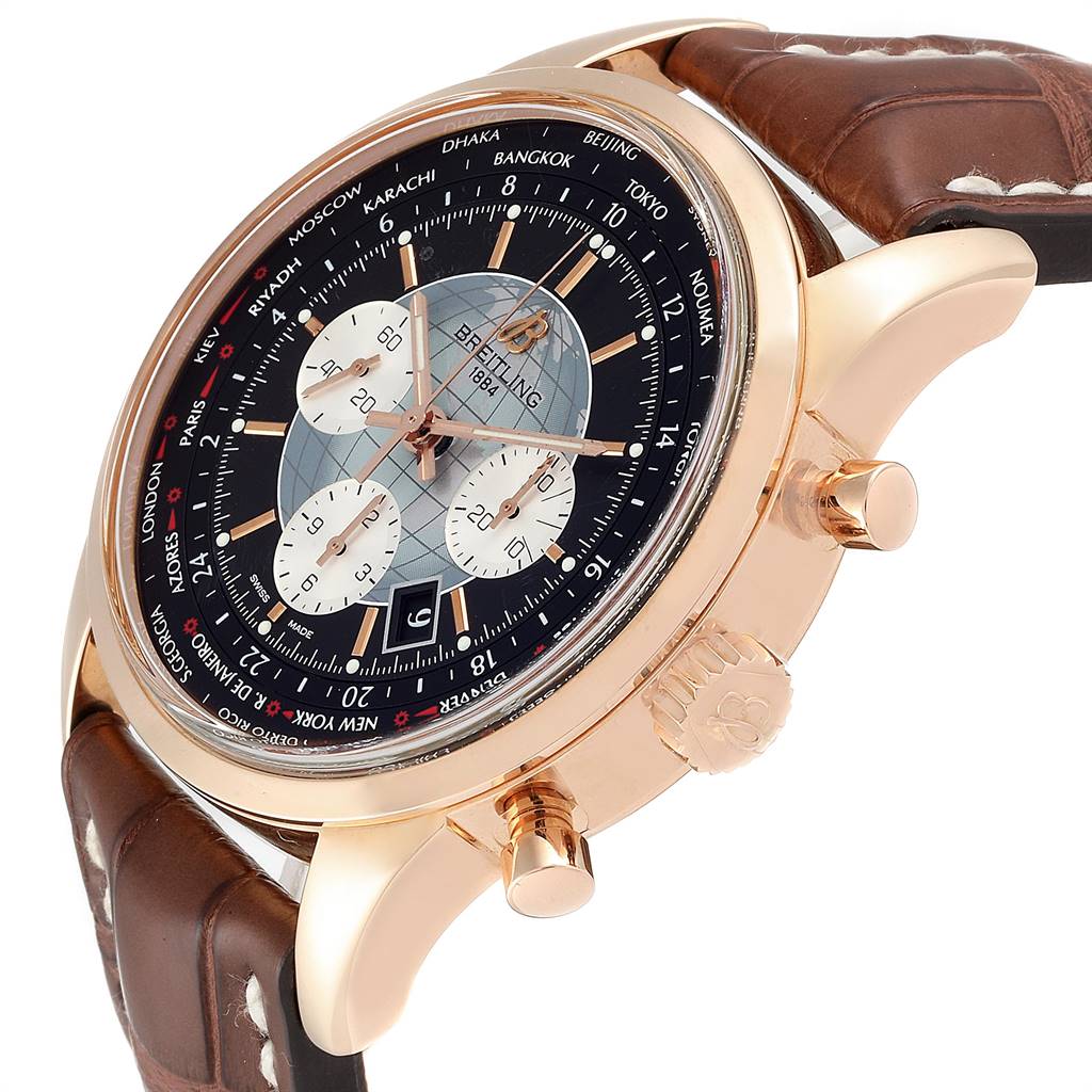 The image shows a side angle of the Breitling Transocean RB0510U4-BB63BKLD Men
s Rose Gold Black Dial RB0510U4-BB63BKLD Men
s Rose Gold Black Dial watch, highlighting its brown leather strap and gold crown with pushers.