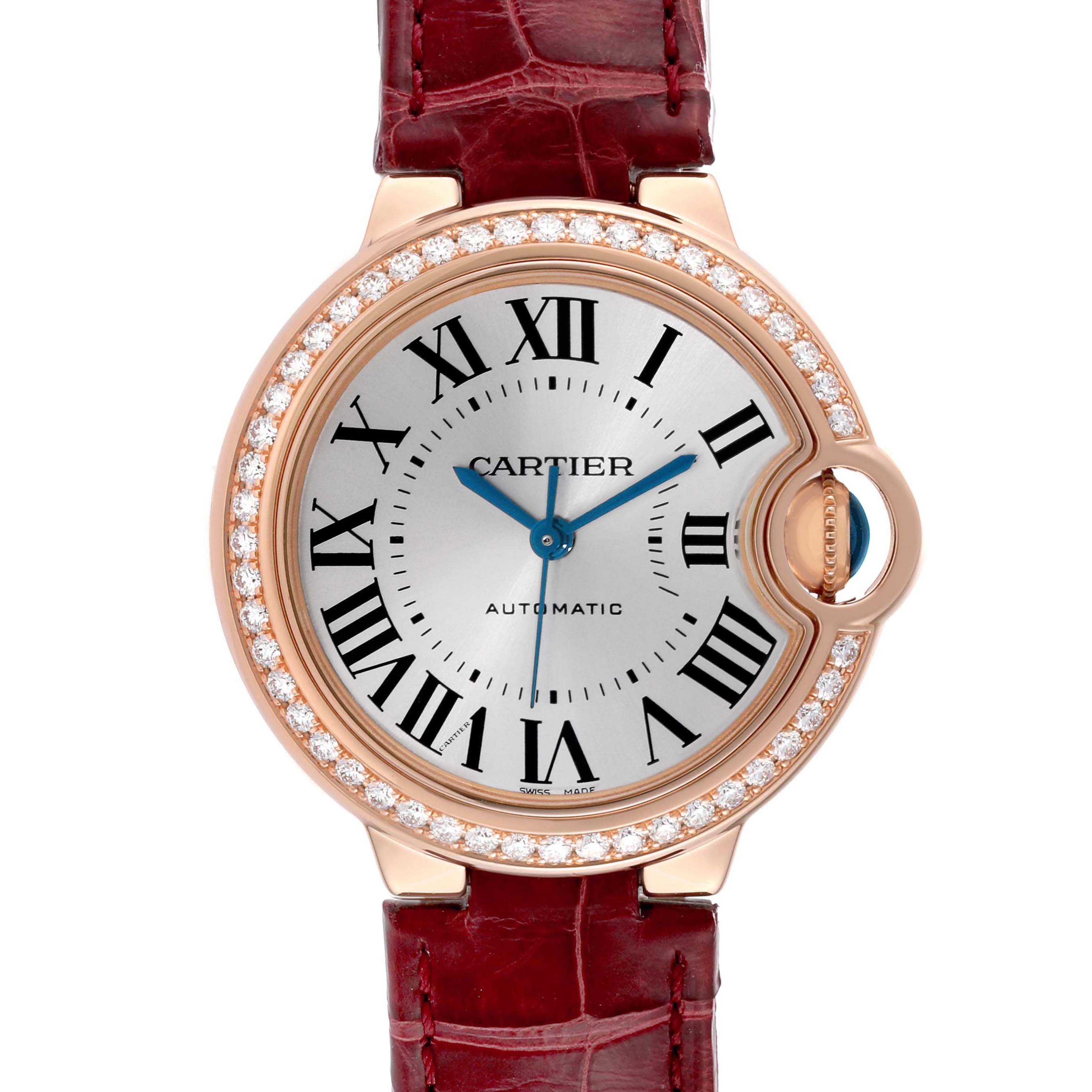 The Cartier Ballon Bleu WJBB0033 Women's Rose Gold Silver Dial watch is shown from the front, highlighting the dial, diamond bezel, and red leather strap.
