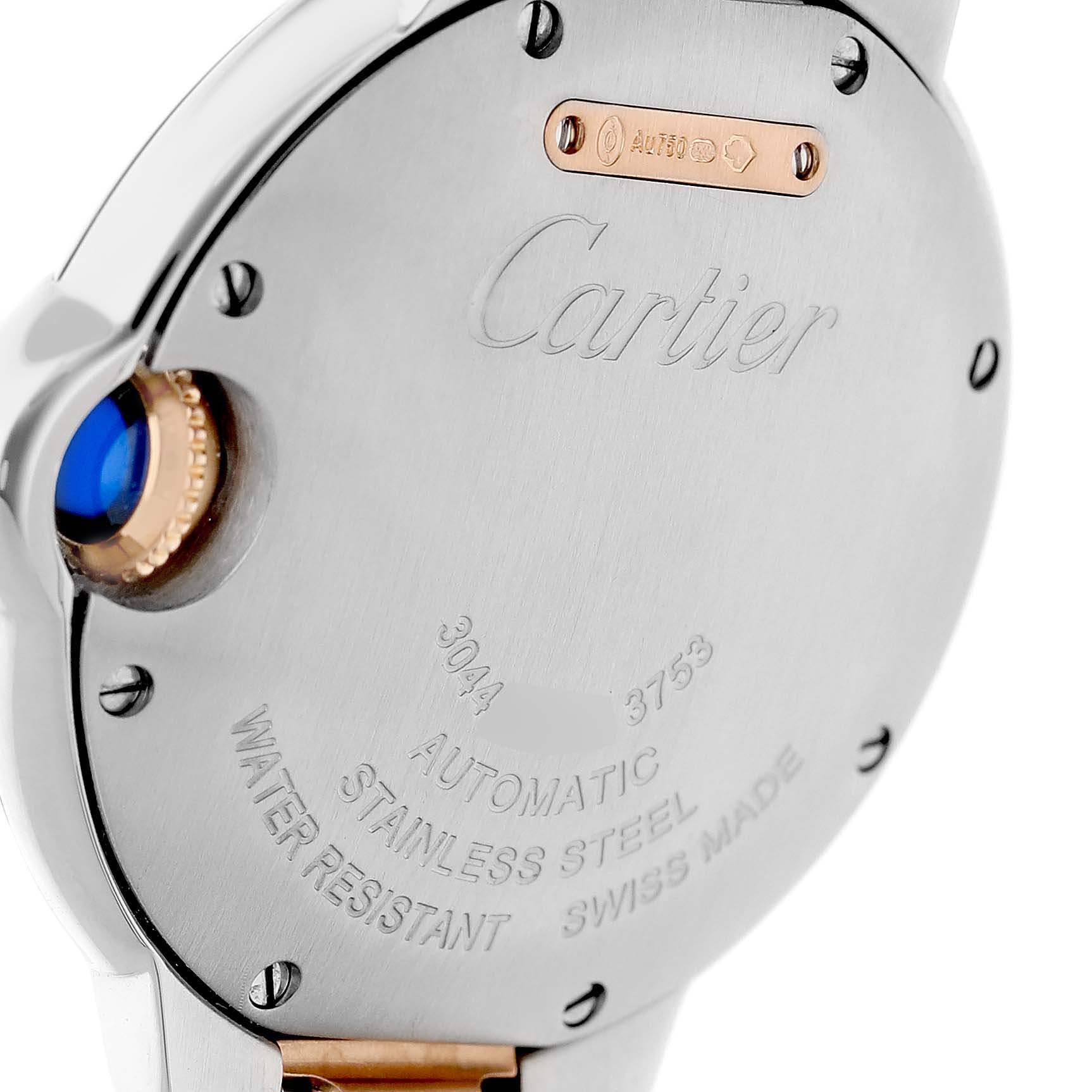The image shows the back of a Cartier Ballon Bleu W2BB0023 Women's Steel and Gold (two tone) Silver Dial watch, highlighting the brand engraving and crown with blue cabochon.