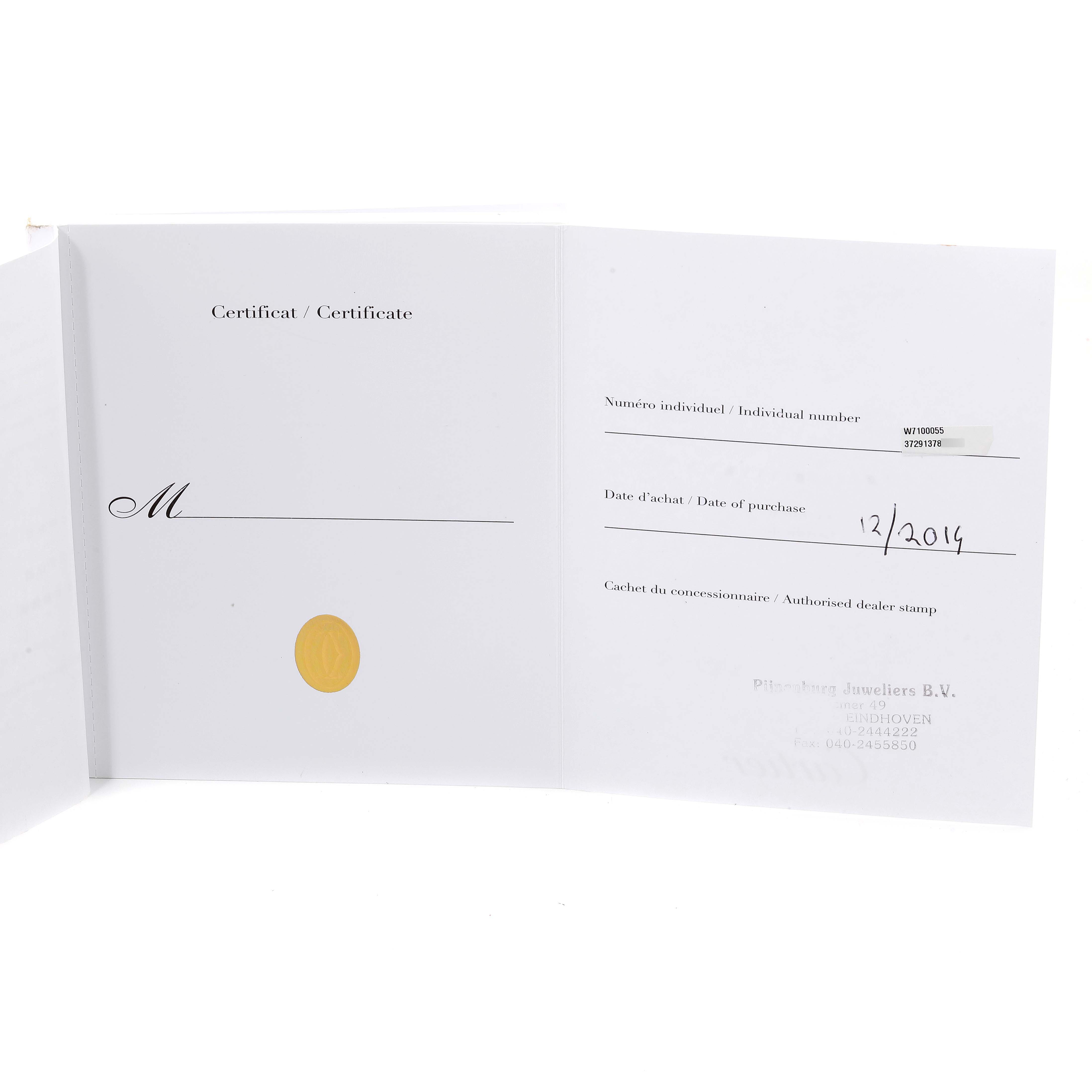 The image shows the warranty certificate for the Calibre de Cartier model by Cartier.