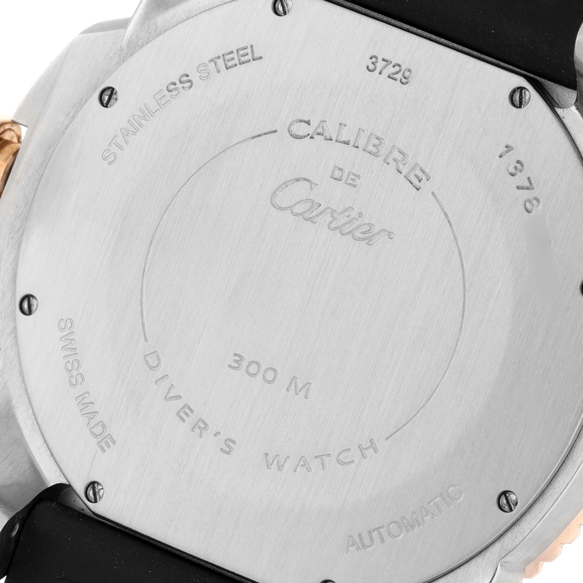 The image shows the back case of a Calibre de Cartier watch by Cartier, displaying engravings and the strap attachment.