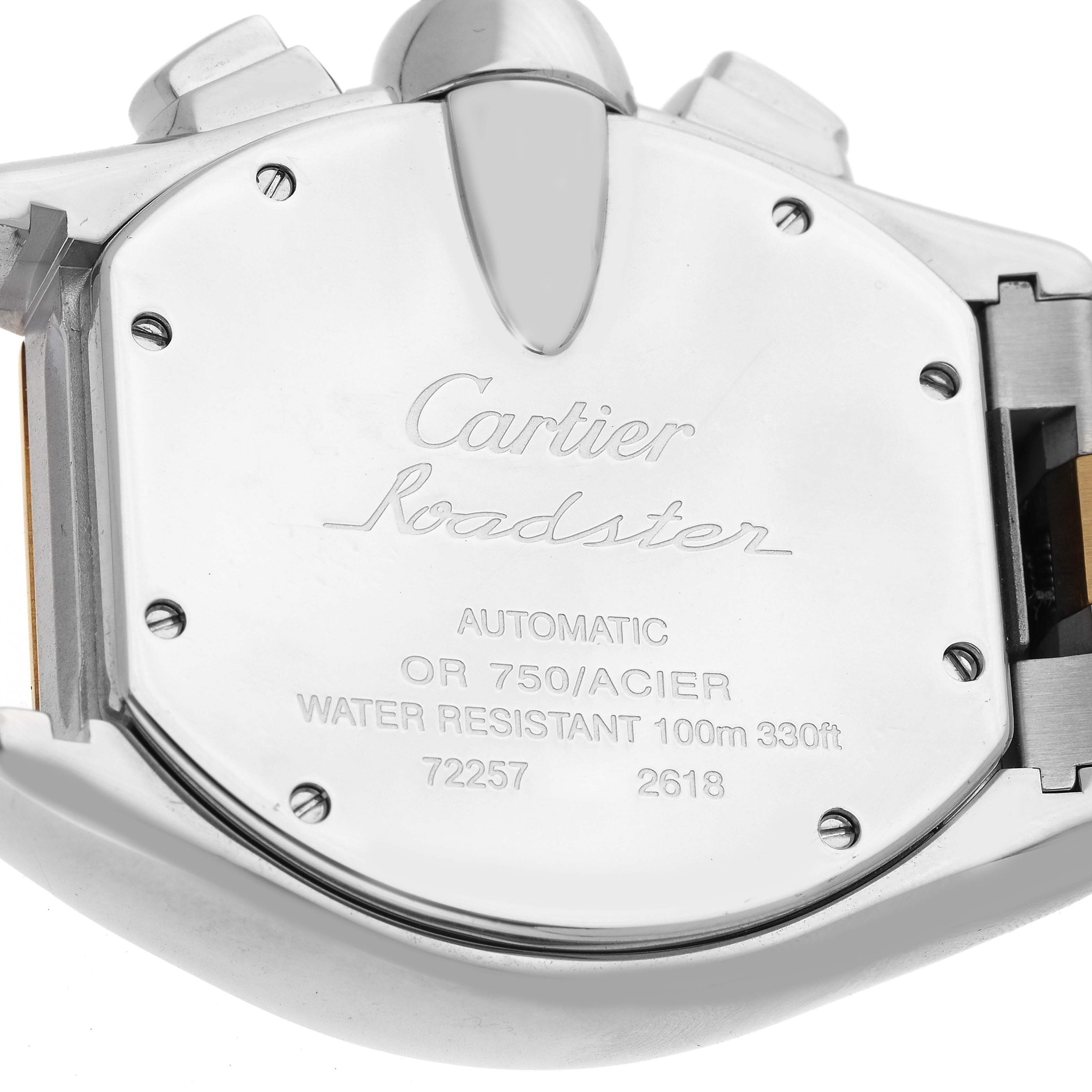 The image shows the back case of a Cartier Roadster W62027Z1 Men's Steel and Gold (two tone) Silver Dial W62027Z1 Men's Steel and Gold (two tone) Silver Dial watch, highlighting brand engravings, model details, and the watch clasp.