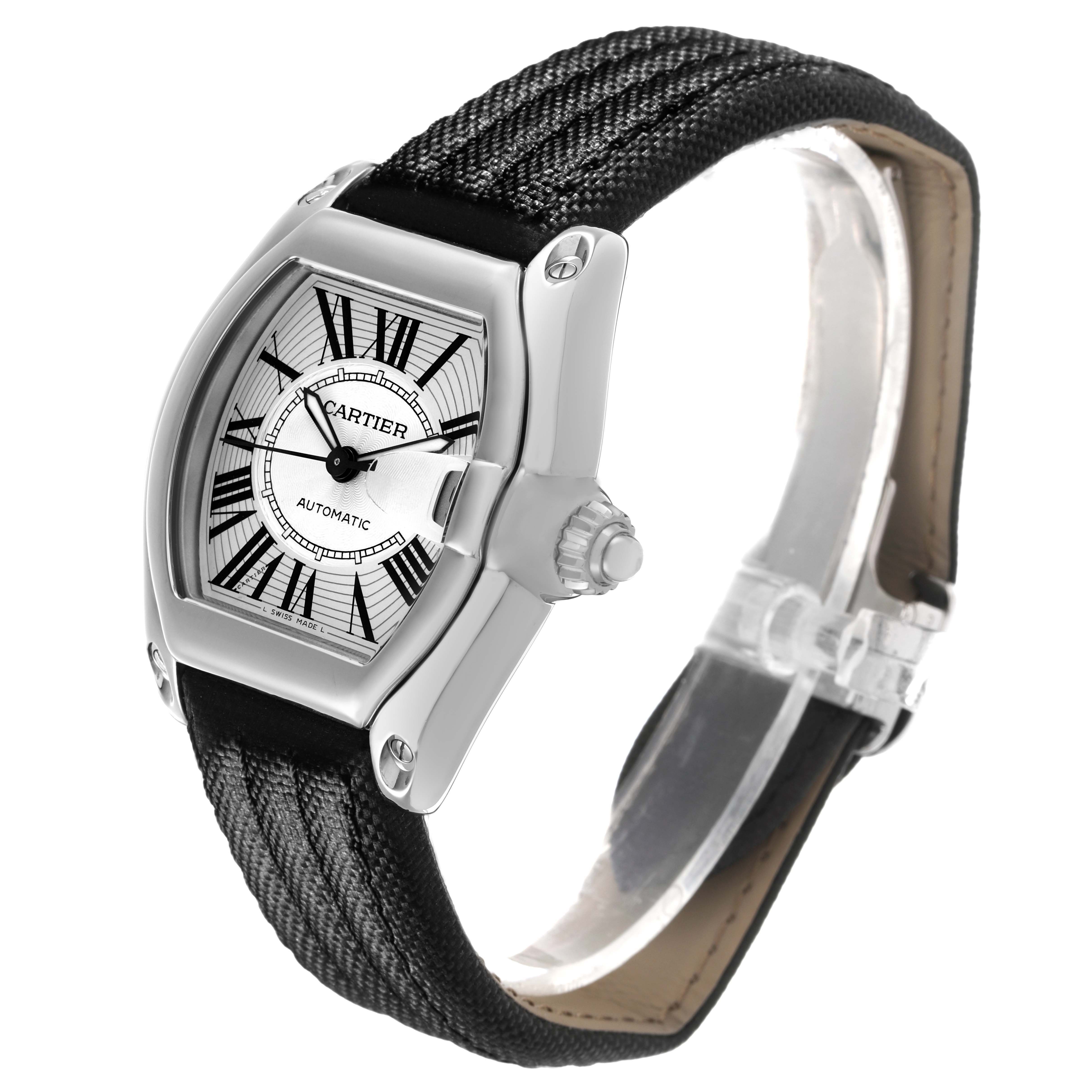 The Cartier Roadster W62025V3 Men's Stainless Steel Silver Dial watch is shown at a three-quarter angle, highlighting the face, crown, and textured strap.