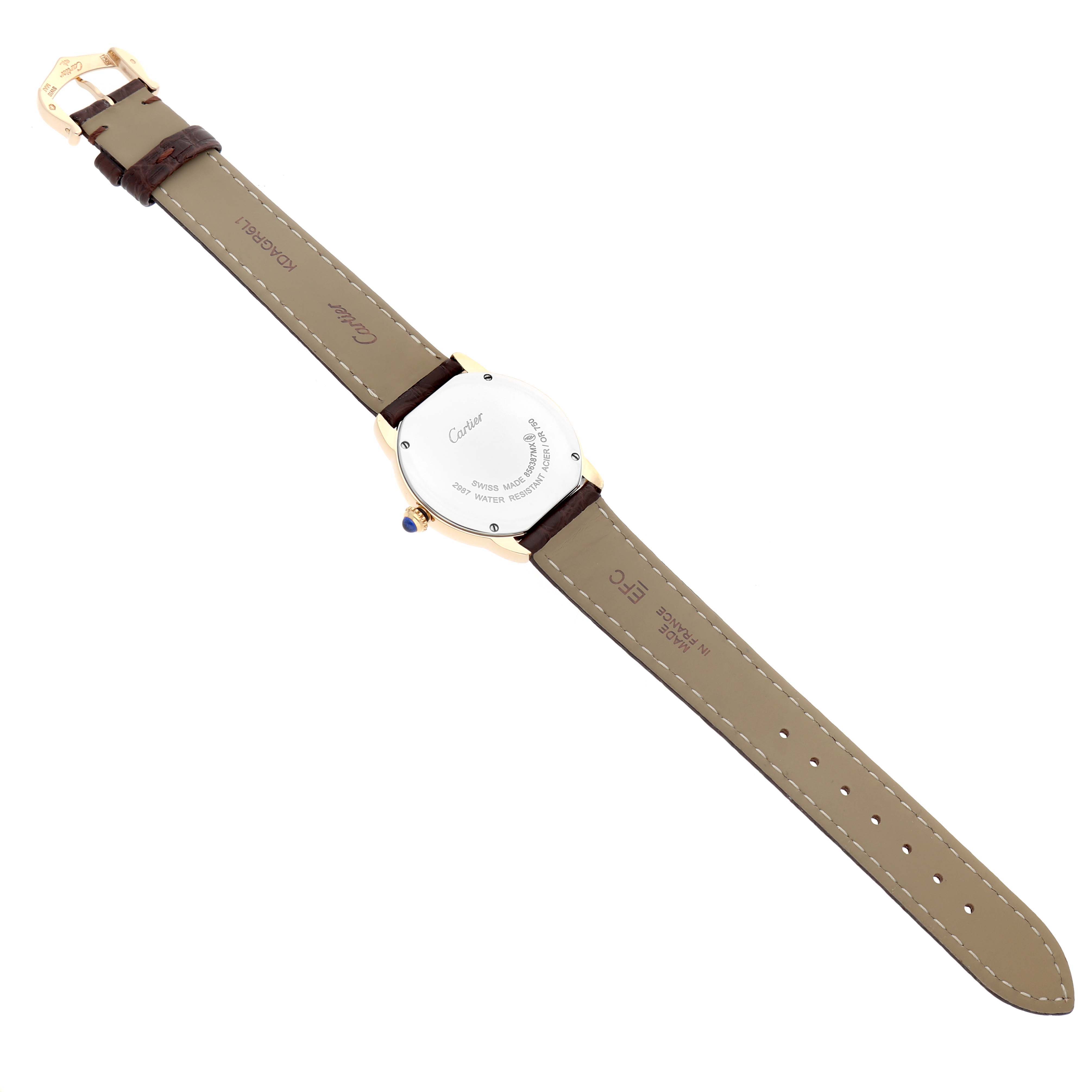 The image shows the back of the Cartier Ronde W6700355 Women's Yellow Gold Silver Dial watch, displaying the case back, strap, buckle, and crown.