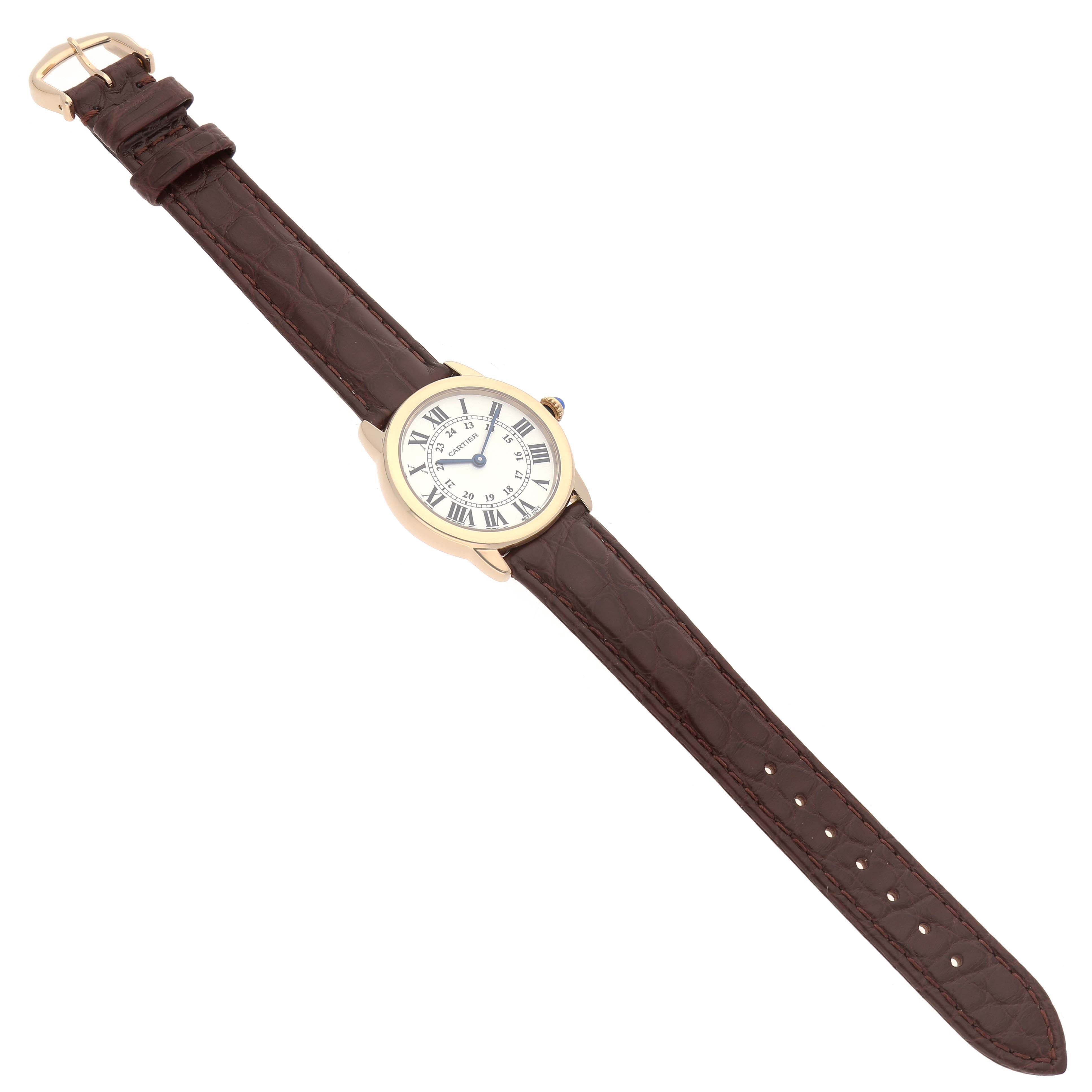 The Cartier Ronde W6700355 Women's Yellow Gold Silver Dial watch is displayed at a slight angle, showing the face with Roman numerals and a brown leather strap.