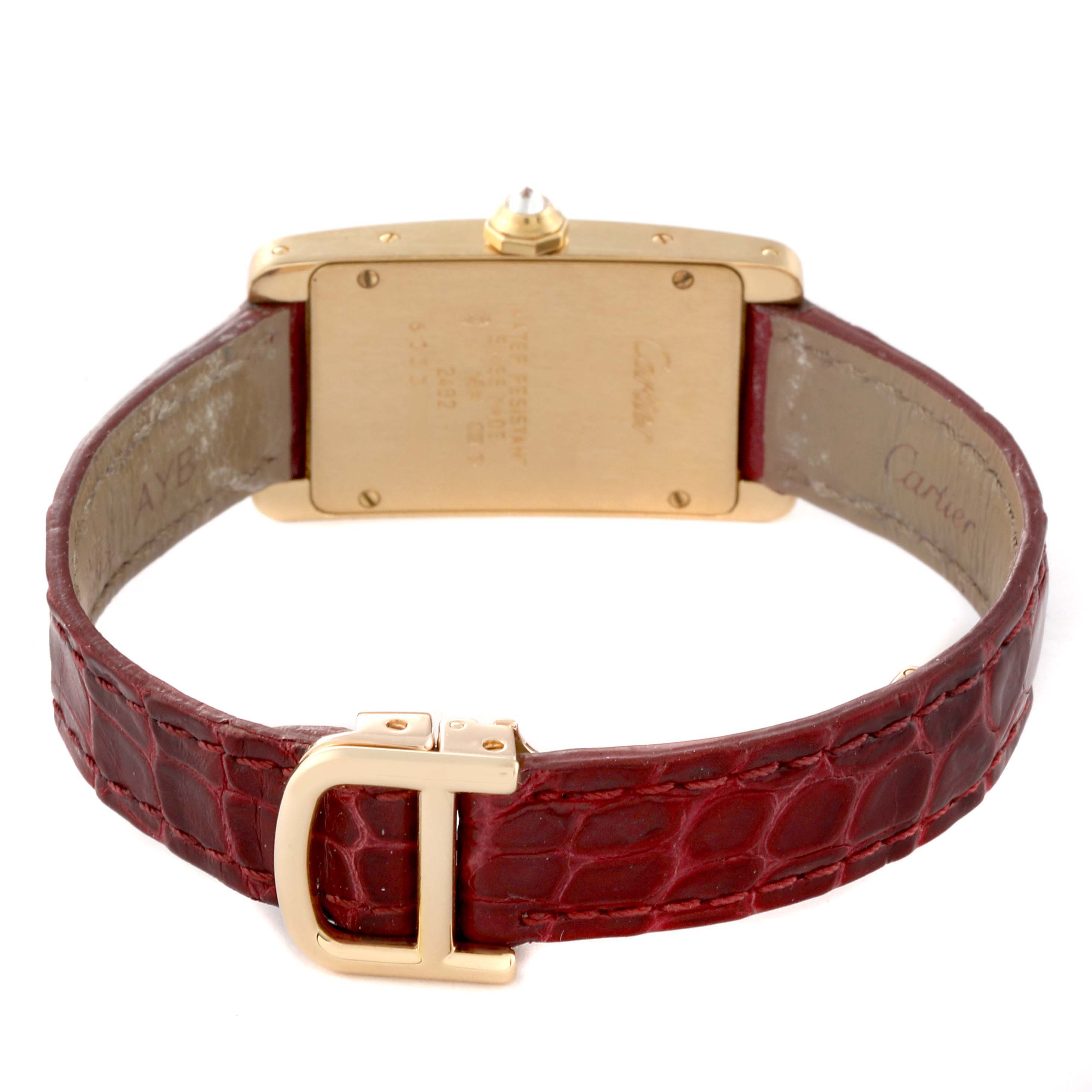 The image shows the back and strap of a Cartier Tank Americaine WB701251 Women's Yellow Gold Silver Dial WB701251 Women's Yellow Gold Silver Dial watch, highlighting the gold case and red leather band with a gold buckle.