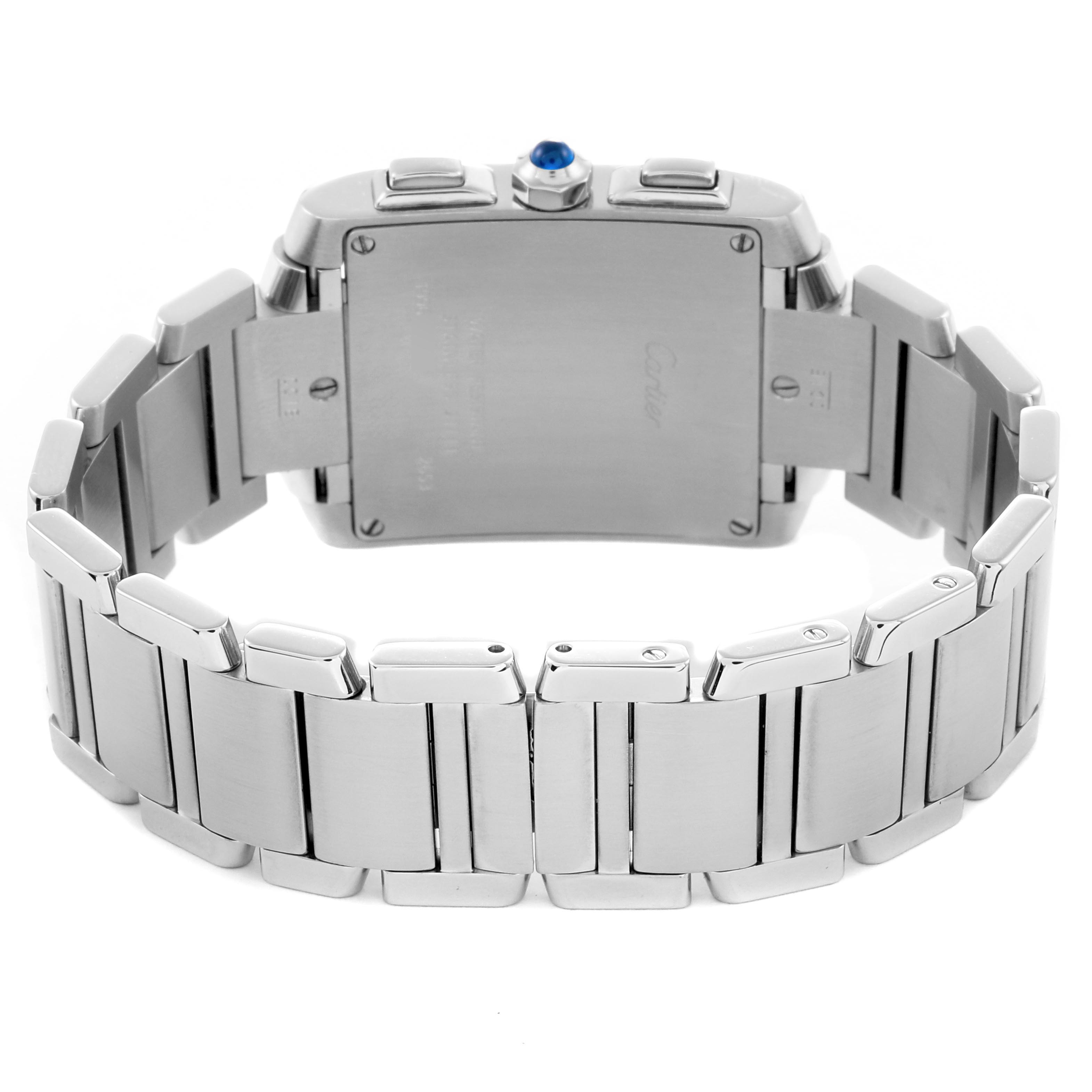 The image shows the back view of the Cartier Tank Française watch, highlighting the case back and stainless steel bracelet.