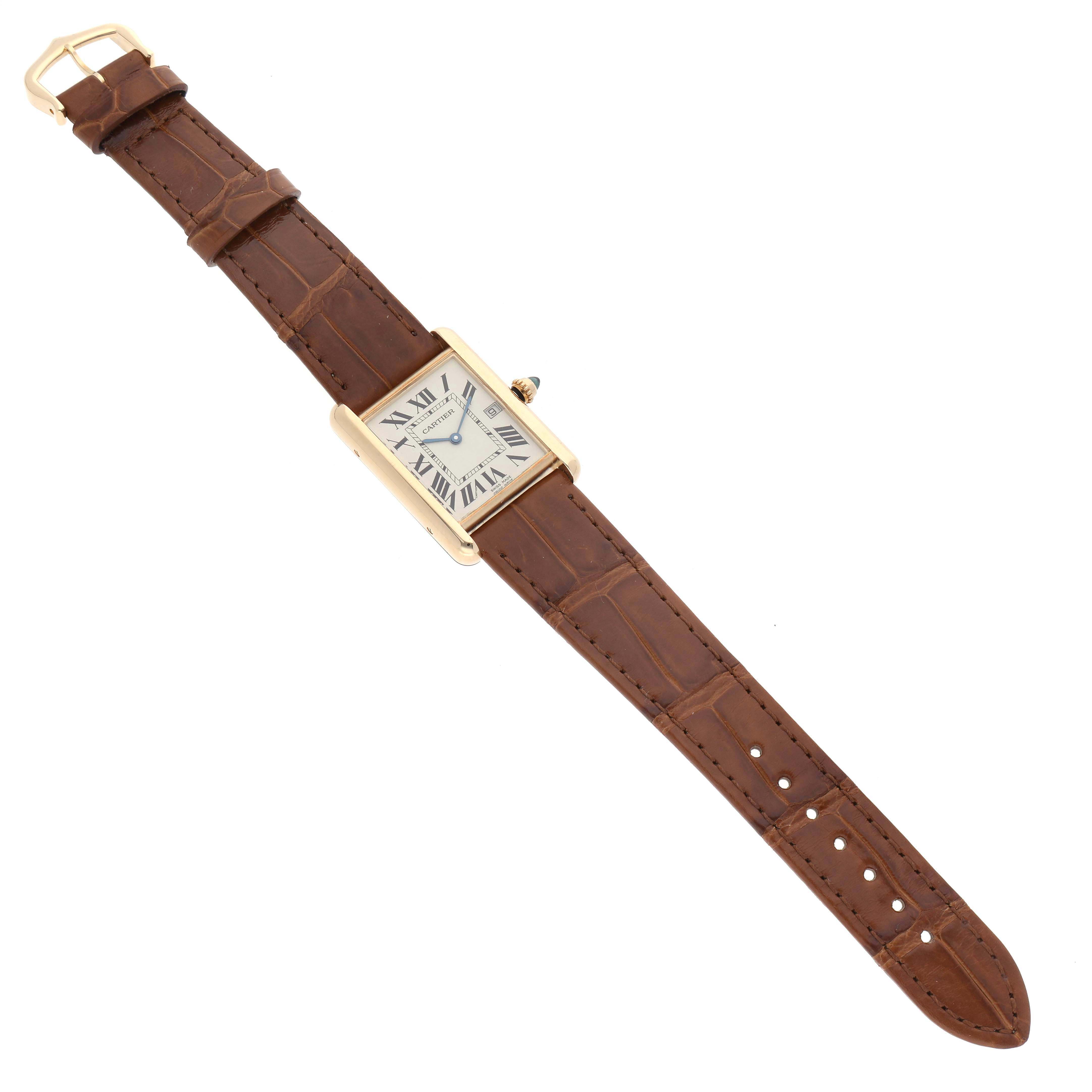 This image shows a top-down view of the Tank Louis model by Cartier, featuring a rectangular face and brown leather strap.