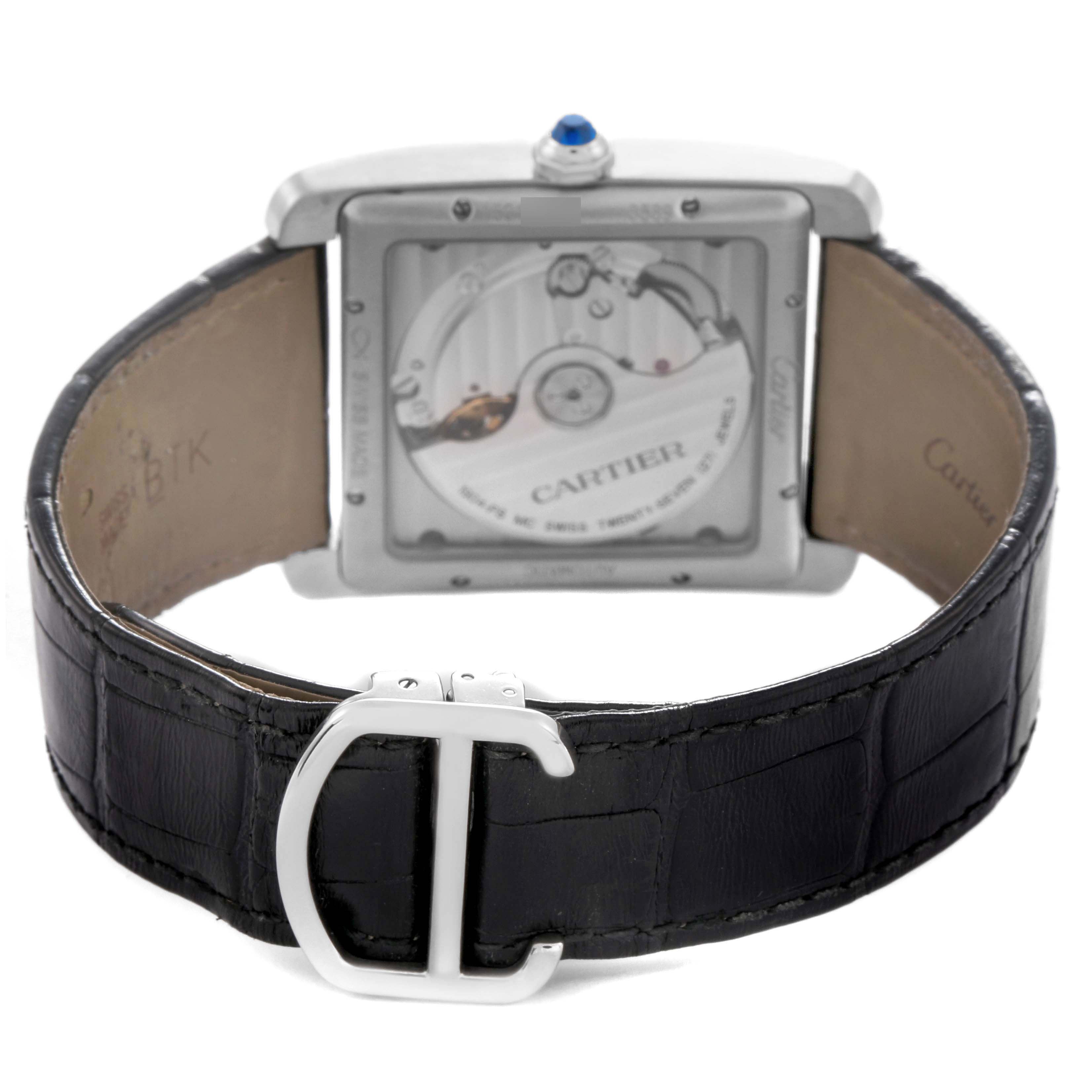 The Cartier Tank MC W5330003 Men
s Stainless Steel Silver Dial W5330003 Men
s Stainless Steel Silver Dial watch is shown from the back, displaying its movement and black leather strap.