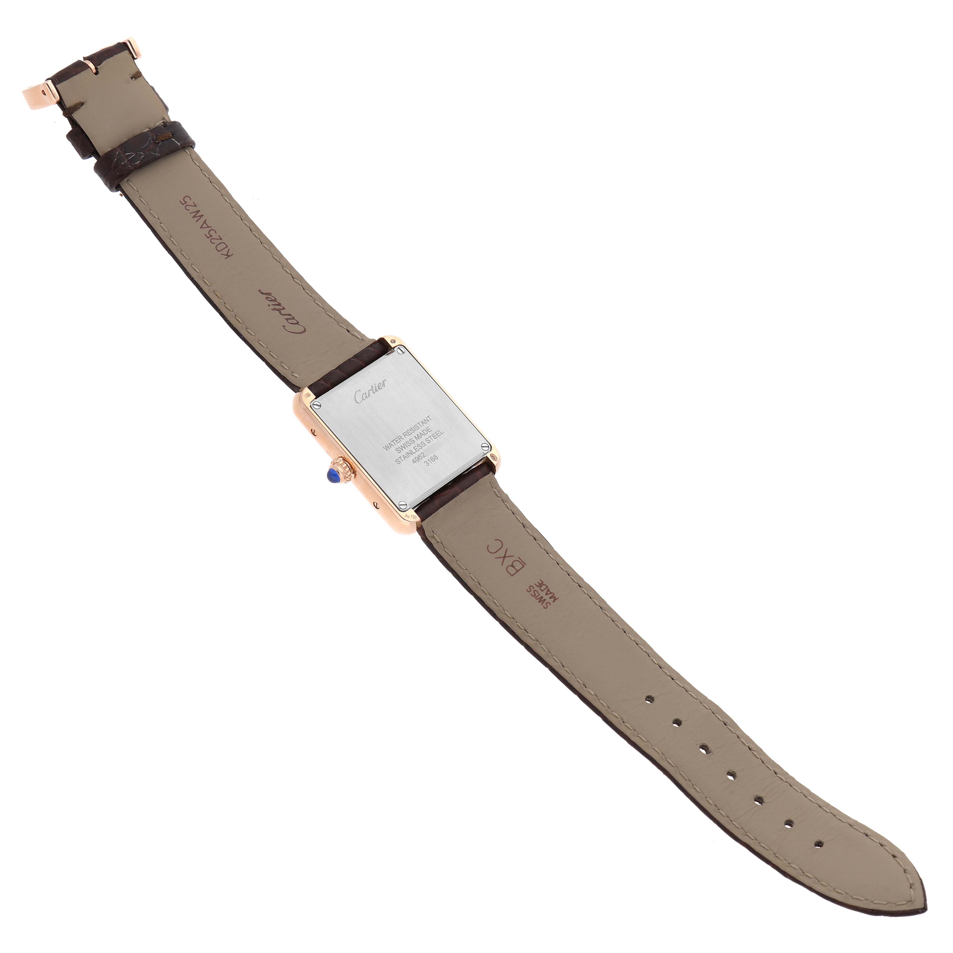 This image shows the back view of a Cartier Tank Solo W5200024 Women's Rose Gold Silver Dial watch, highlighting the case back, strap, and buckle.
