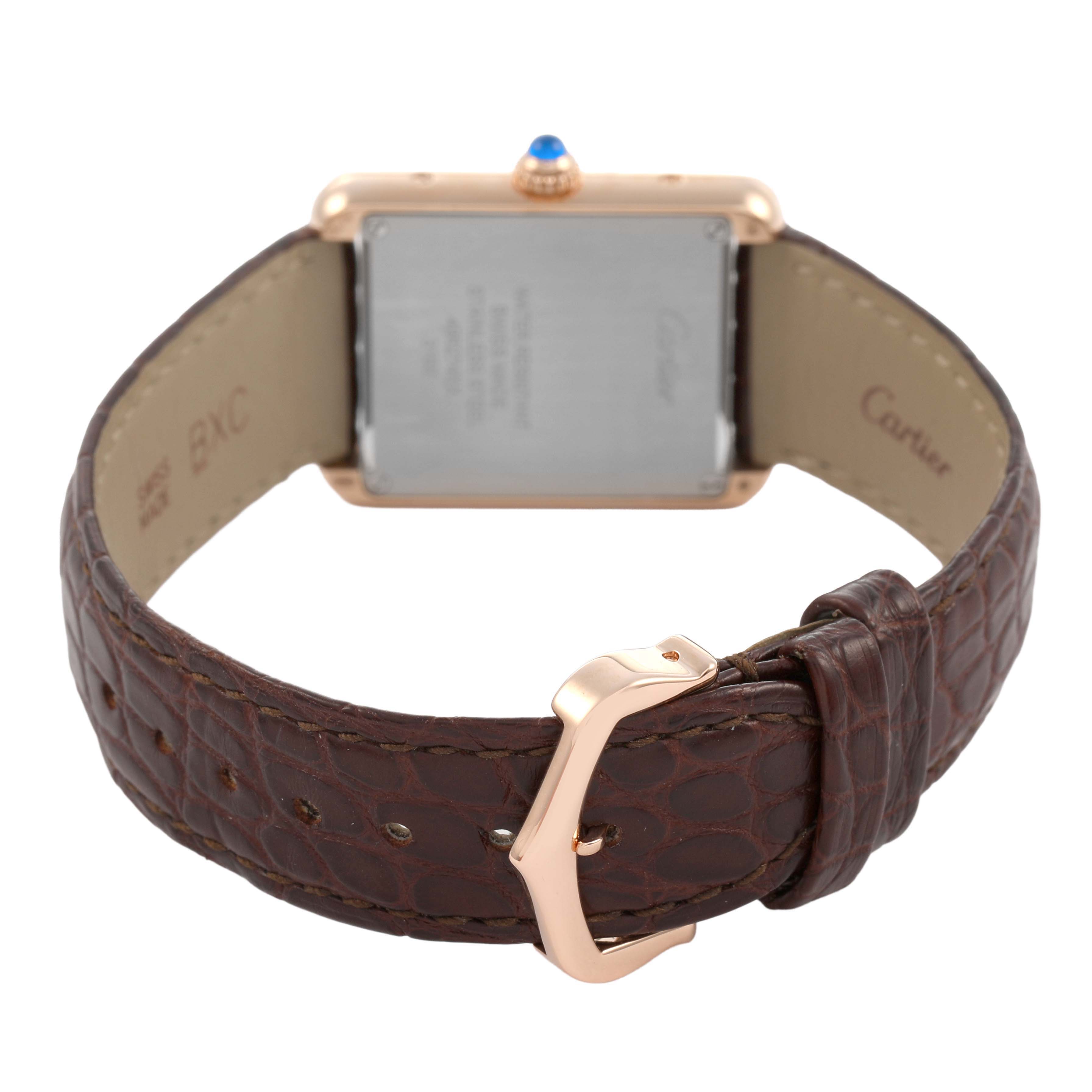 The image shows the back of a Cartier Tank Solo W5200024 Women's Rose Gold Silver Dial watch, highlighting the buckle, strap, and case back.