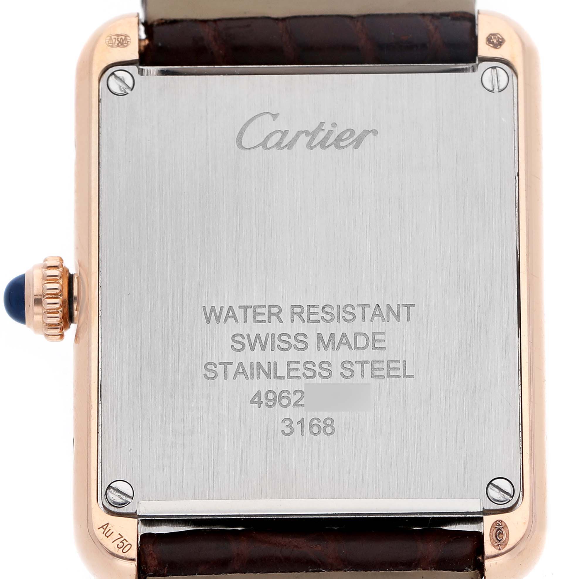 The image shows the back of a Cartier Tank Solo W5200024 Women's Rose Gold Silver Dial watch, displaying its stainless steel case, crown, and engraved details.