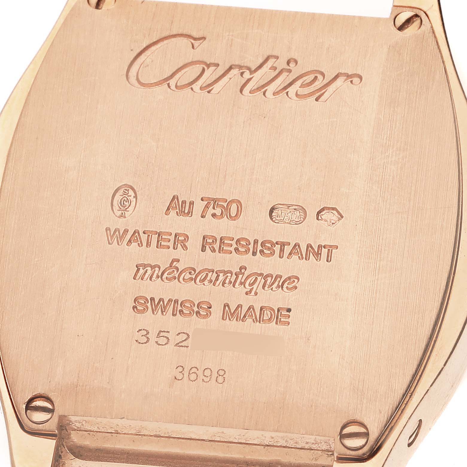 The image shows the back case of a Cartier Tortue WA501010 Women's Rose Gold Silver Dial WA501010 Women's Rose Gold Silver Dial watch, highlighting its hallmark engravings and water-resistant features.