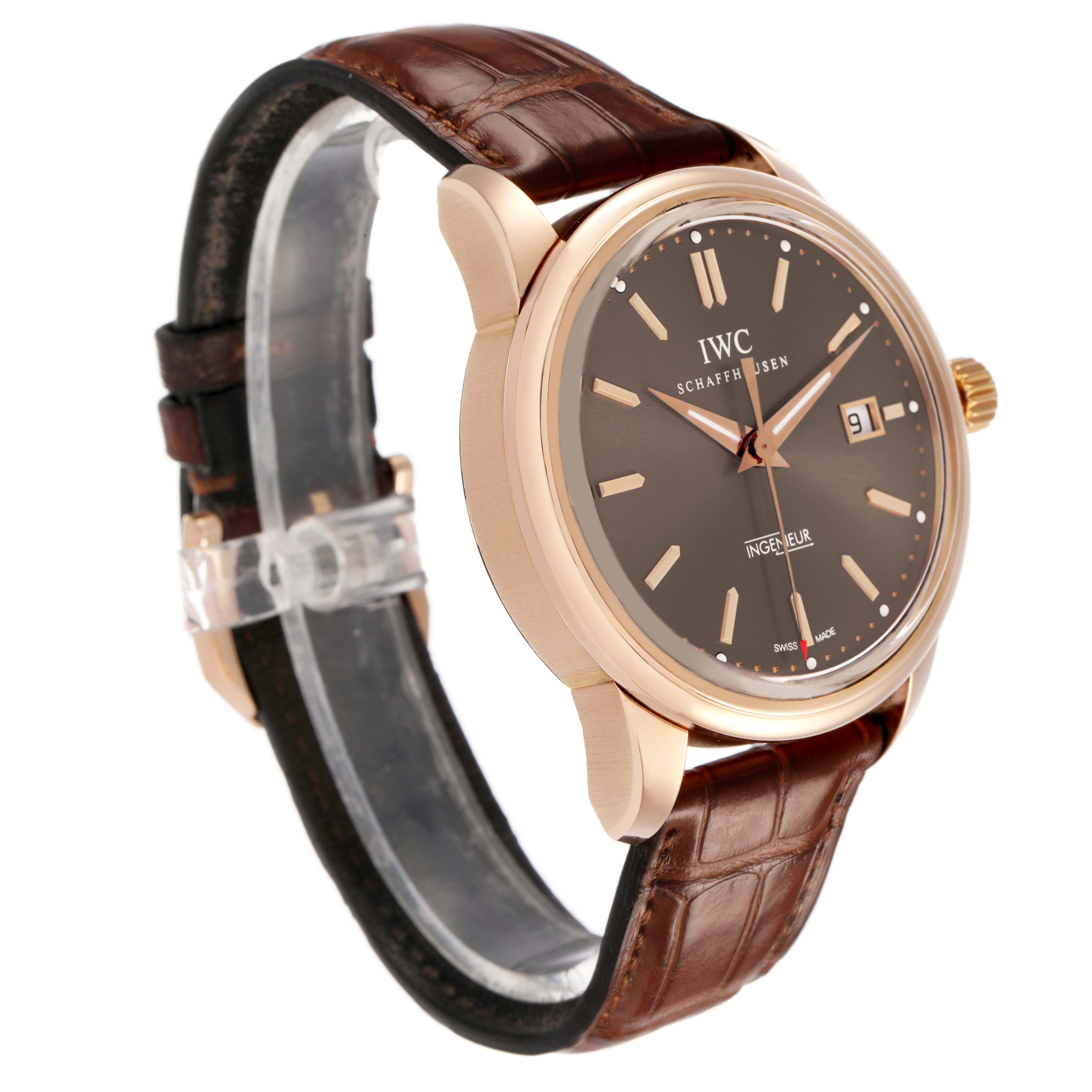 The IWC Ingenieur IW323312 Men's Rose Gold Brown Dial watch is shown from a side angle, displaying the dial, case, and brown leather strap.