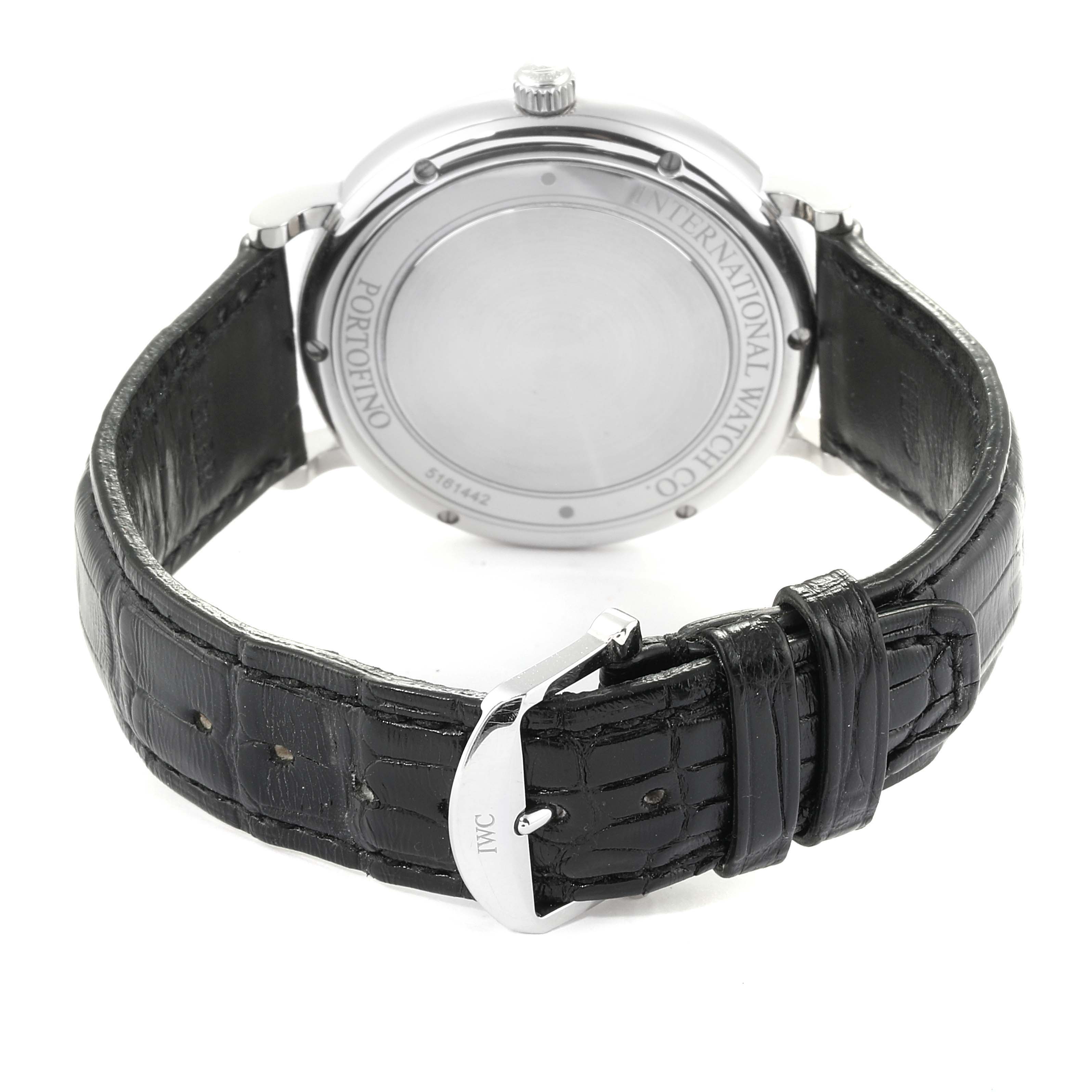 The photo shows the back and strap of the IWC Portofino IW356501 Men's Stainless Steel Silver Dial IW356501 Men's Stainless Steel Silver Dial watch, highlighting its leather band and clasp.
