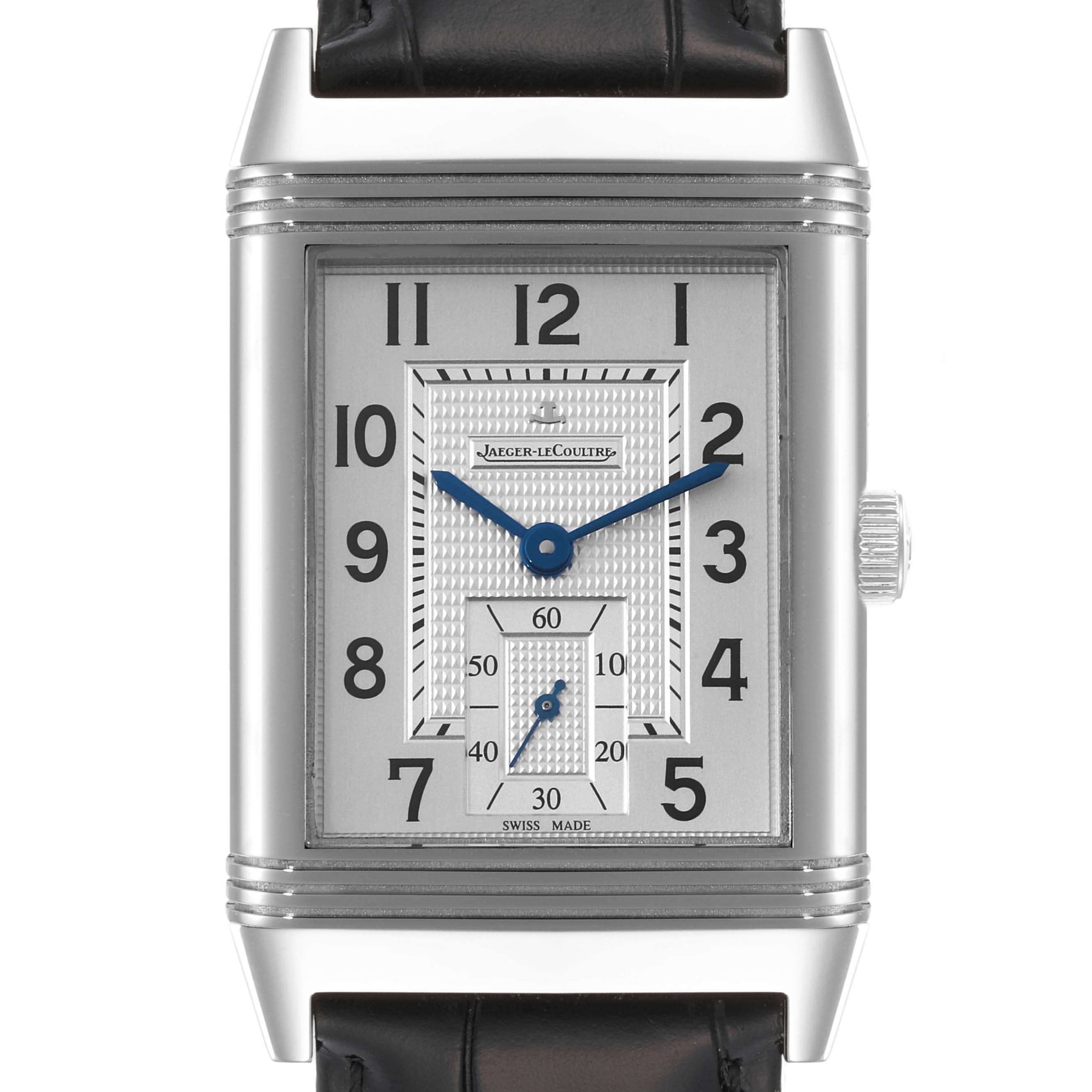 The Jaeger-LeCoultre Reverso watch is shown from a front angle, highlighting the face, numerals, and the strap.