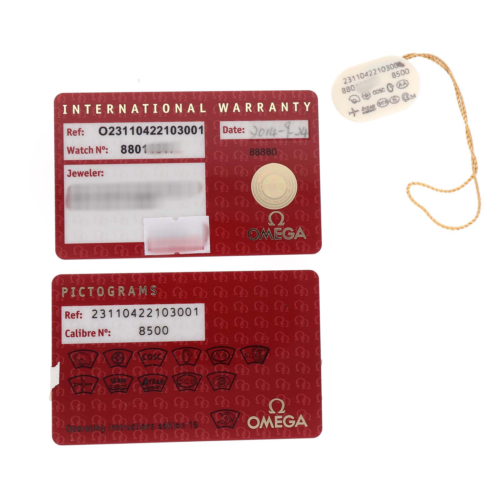 The image shows warranty and pictogram cards, and a hang tag for the Omega Seamaster 231.10.42.21.03.001 Men's Stainless Steel Blue Dial model, displayed from above.