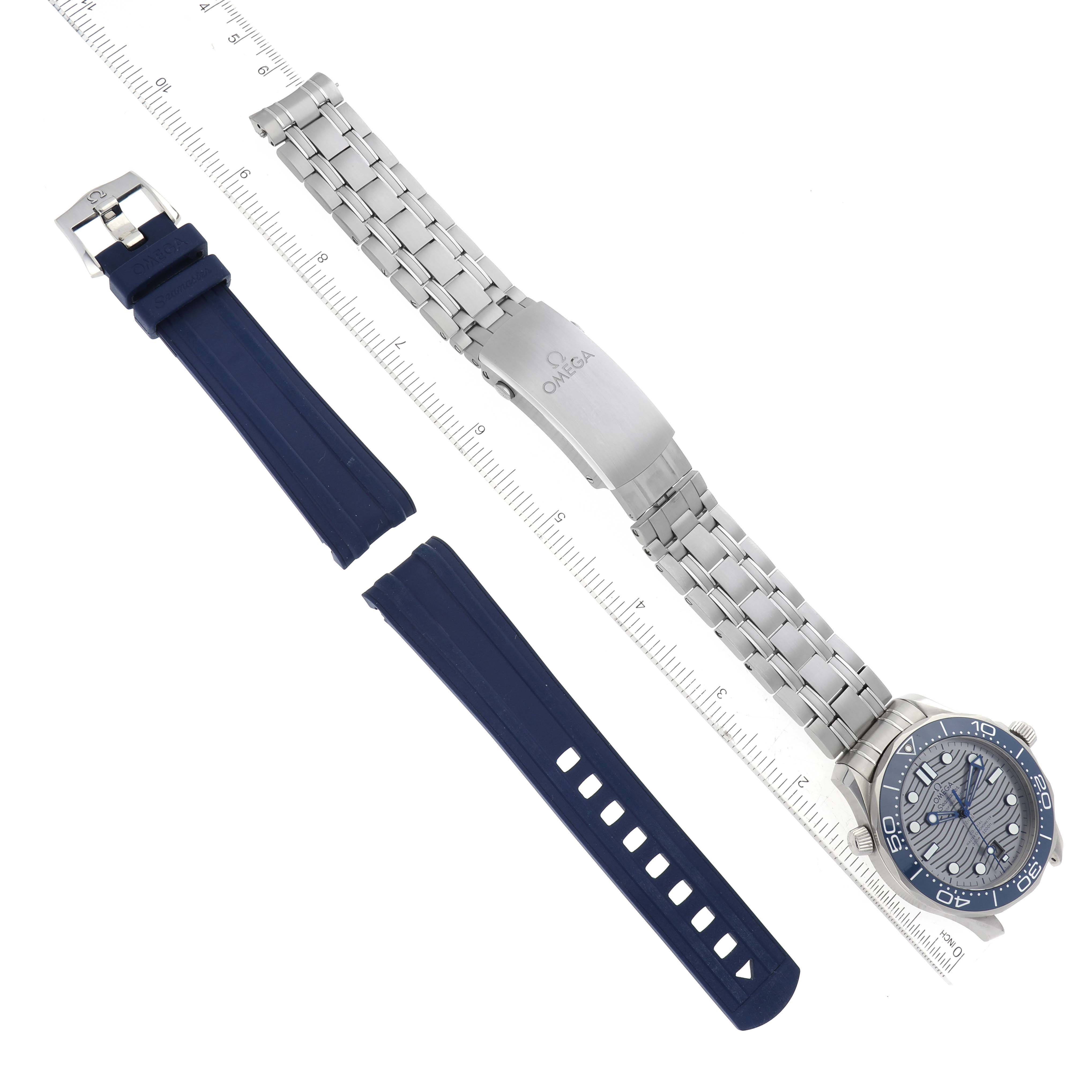 The image shows an Omega Seamaster 210.30.42.20.06.001 Men's Stainless Steel Grey Dial 210.30.42.20.06.001 Men's Stainless Steel Grey Dial watch, a metal bracelet, and blue rubber strap accessories.