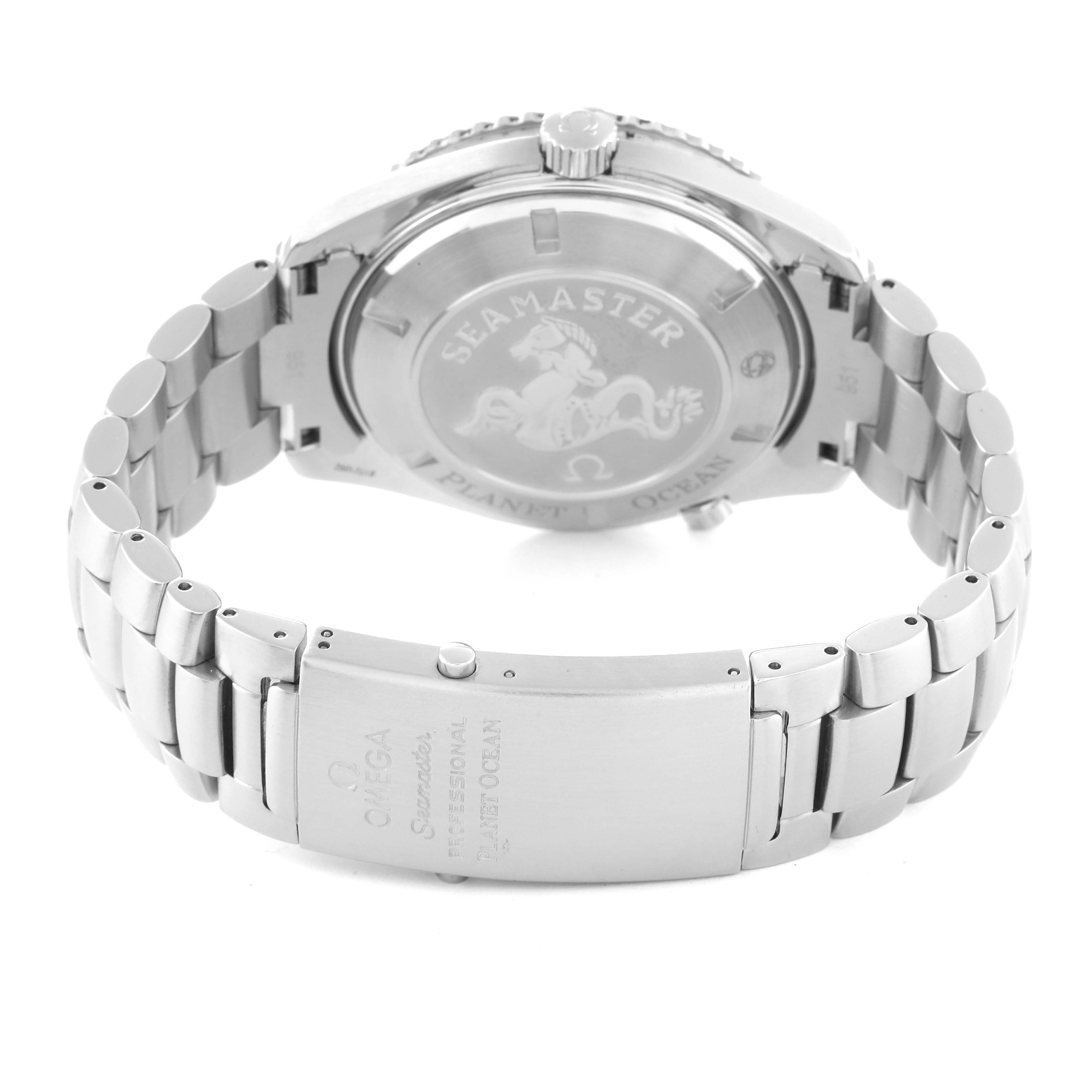 The image shows the back and clasp of an Omega Planet Ocean 2200.51.00 Men's Stainless Steel Black Dial 2200.51.00 Men's Stainless Steel Black Dial watch, highlighting the case back engraving and bracelet.
