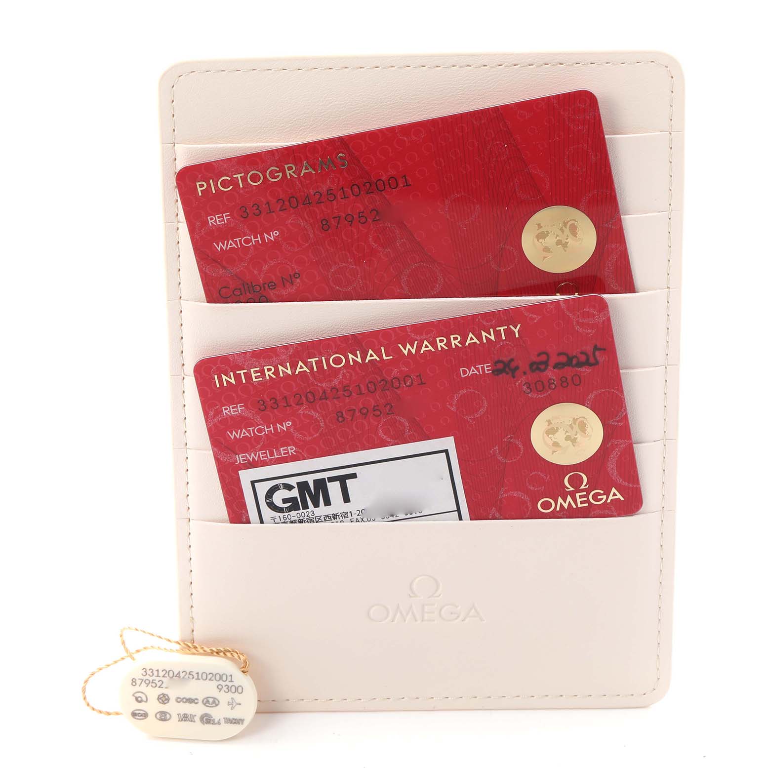 The image shows Omega Speedmaster 331.20.42.51.02.001 Men
s Steel and Gold (two tone) Silver Dial 331.20.42.51.02.001 Men
s Steel and Gold (two tone) Silver Dial model warranty cards and an identification tag in a cream cardholder.