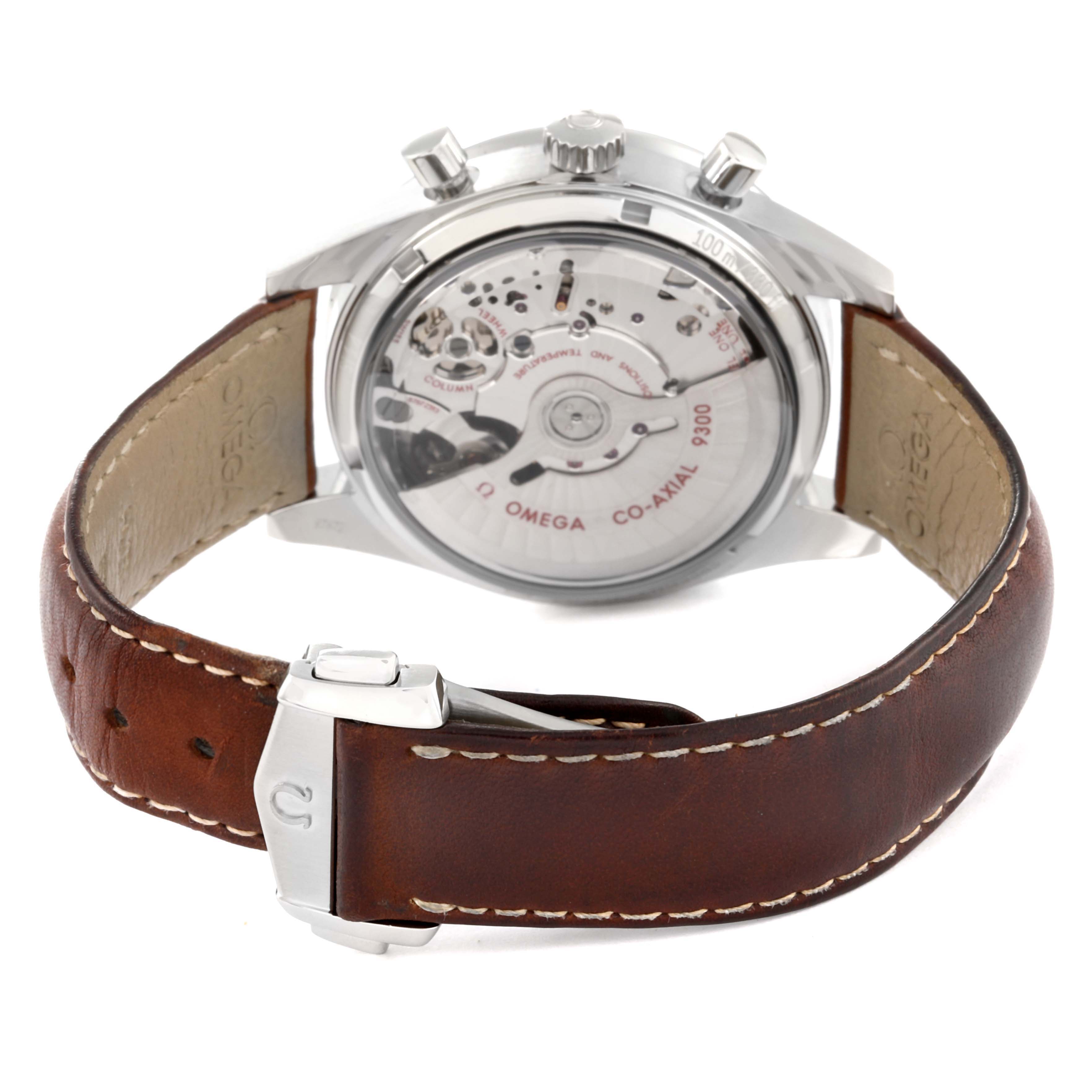 The image shows the back view of an Omega Speedmaster 331.12.42.51.01.002 Men
s Stainless Steel Black Dial 331.12.42.51.01.002 Men
s Stainless Steel Black Dial watch, highlighting its Co-Axial 9300 movement and brown leather strap.