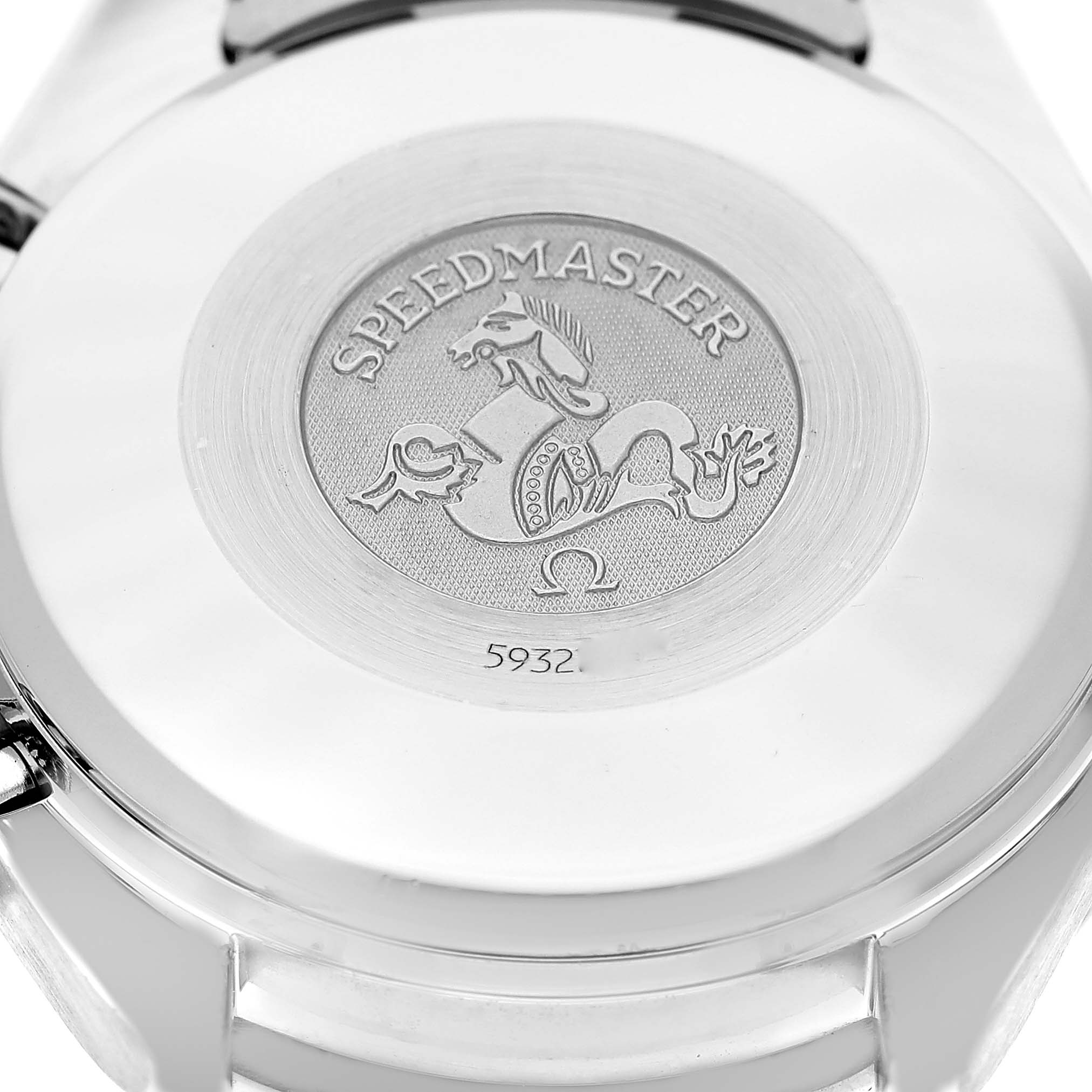 The image shows the case back of an Omega Speedmaster 3513.30.00 Men's Stainless Steel Silver Dial, featuring its engraved emblem and serial number.