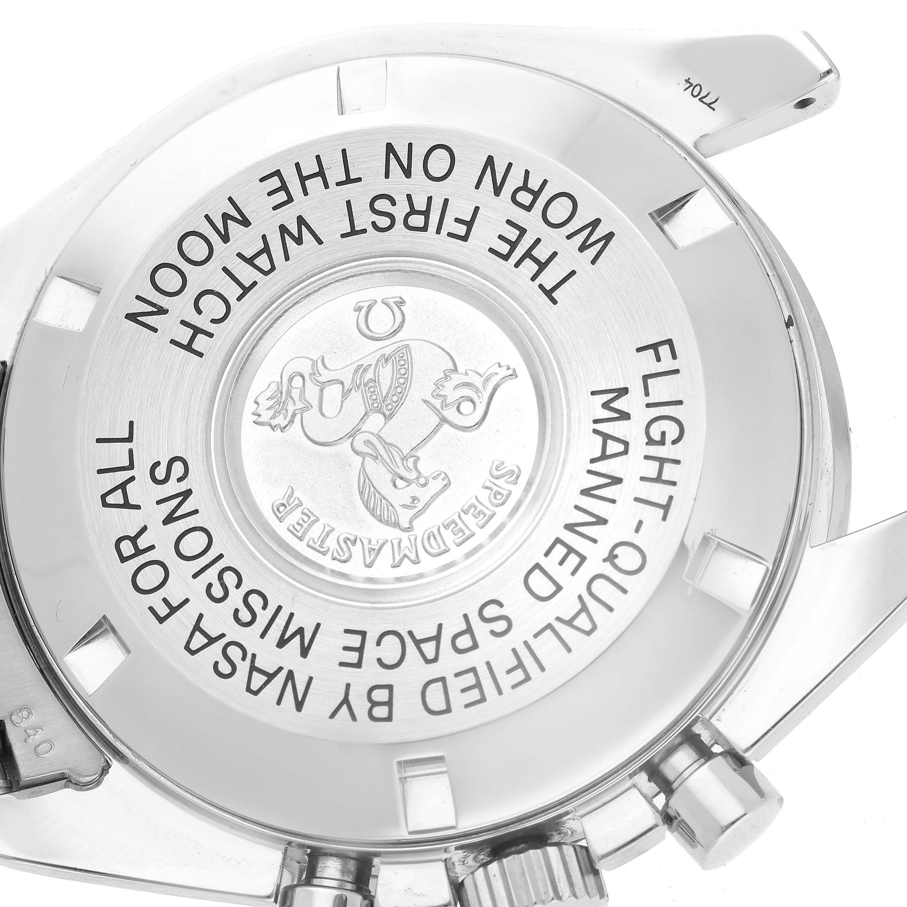 The image shows the back case of an Omega Speedmaster 3570.50.00 Men
s Stainless Steel Black Dial 3570.50.00 Men
s Stainless Steel Black Dial watch at an angled view.