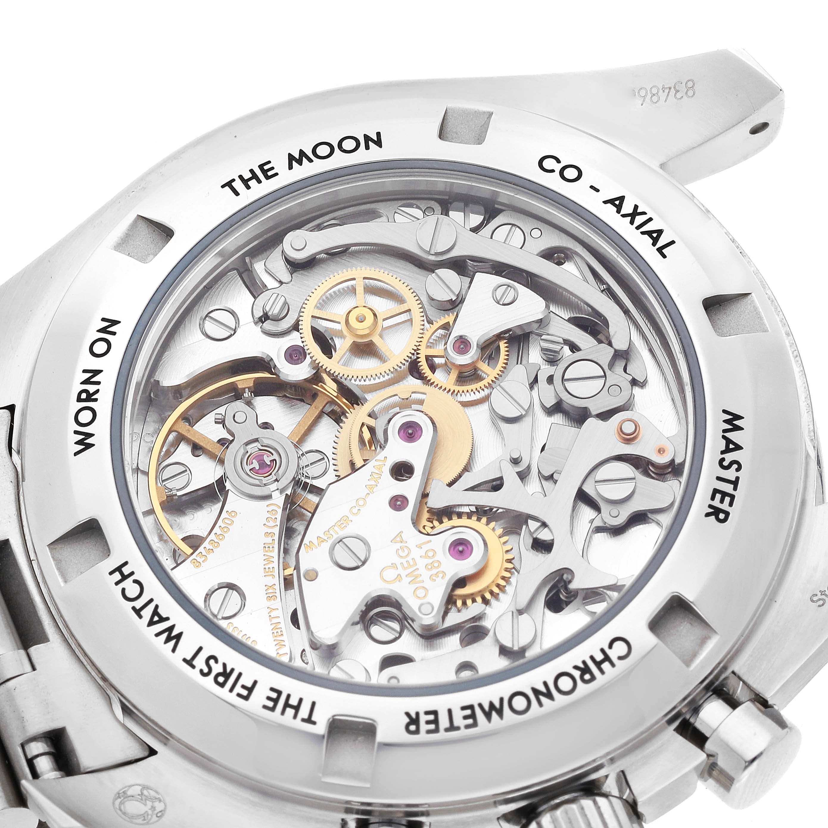 The image shows the back of the Omega Speedmaster 310.30.42.50.01.002 Men
s Stainless Steel Black Dial 310.30.42.50.01.002 Men
s Stainless Steel Black Dial watch, highlighting its intricate mechanical movement.