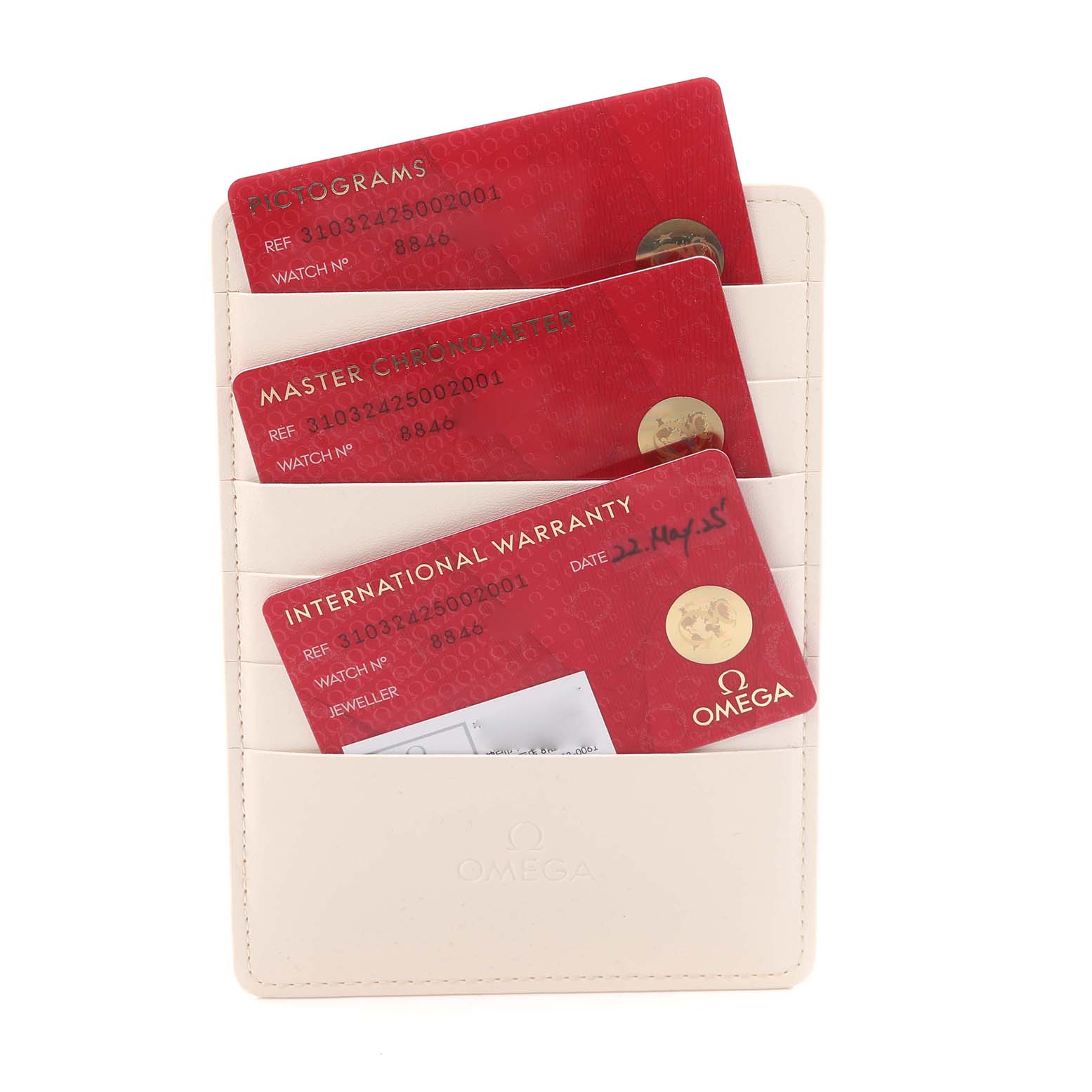 The image shows Omega Speedmaster 310.32.42.50.02.001 Men's Stainless Steel Silver Dial 310.32.42.50.02.001 Men's Stainless Steel Silver Dial cards, including pictograms, master chronometer, and international warranty, in a cream cardholder.