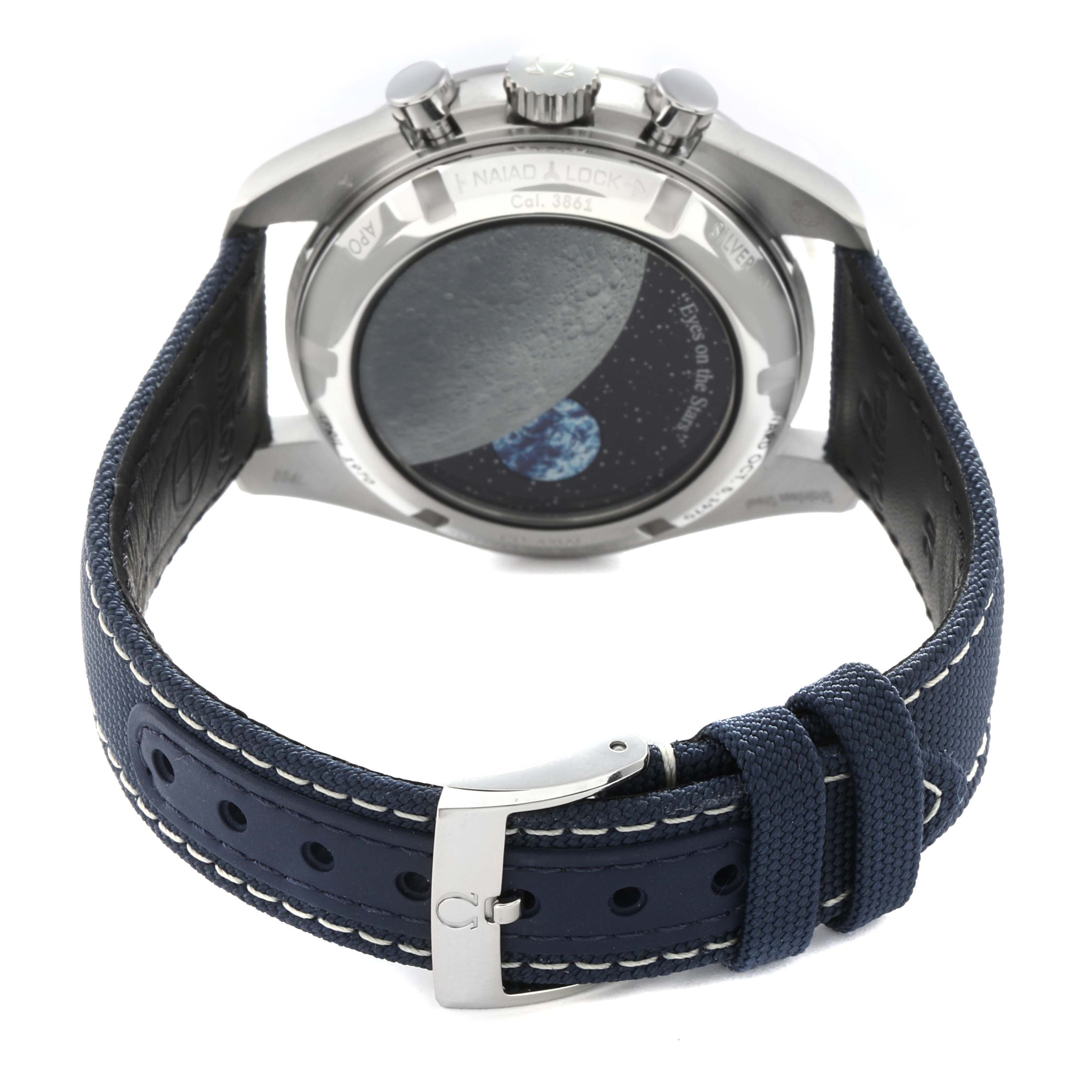 The image shows the back case and strap of an Omega Speedmaster 310.32.42.50.02.001 Men's Stainless Steel Silver Dial 310.32.42.50.02.001 Men's Stainless Steel Silver Dial watch, featuring a space-themed design on the case back.